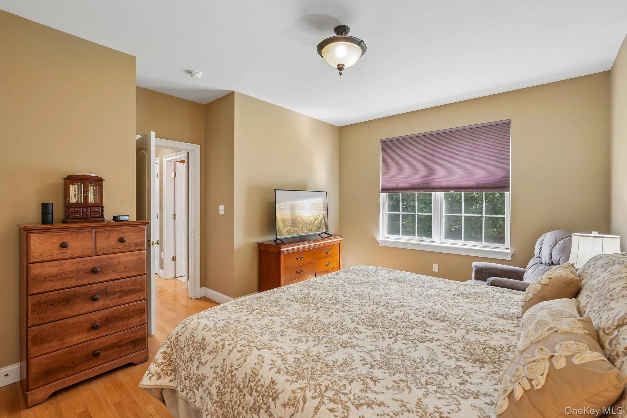 First Floor bedroom with hardwood floors and two wall closets. First Floor bedroom with hardwood floors and two wall closets.