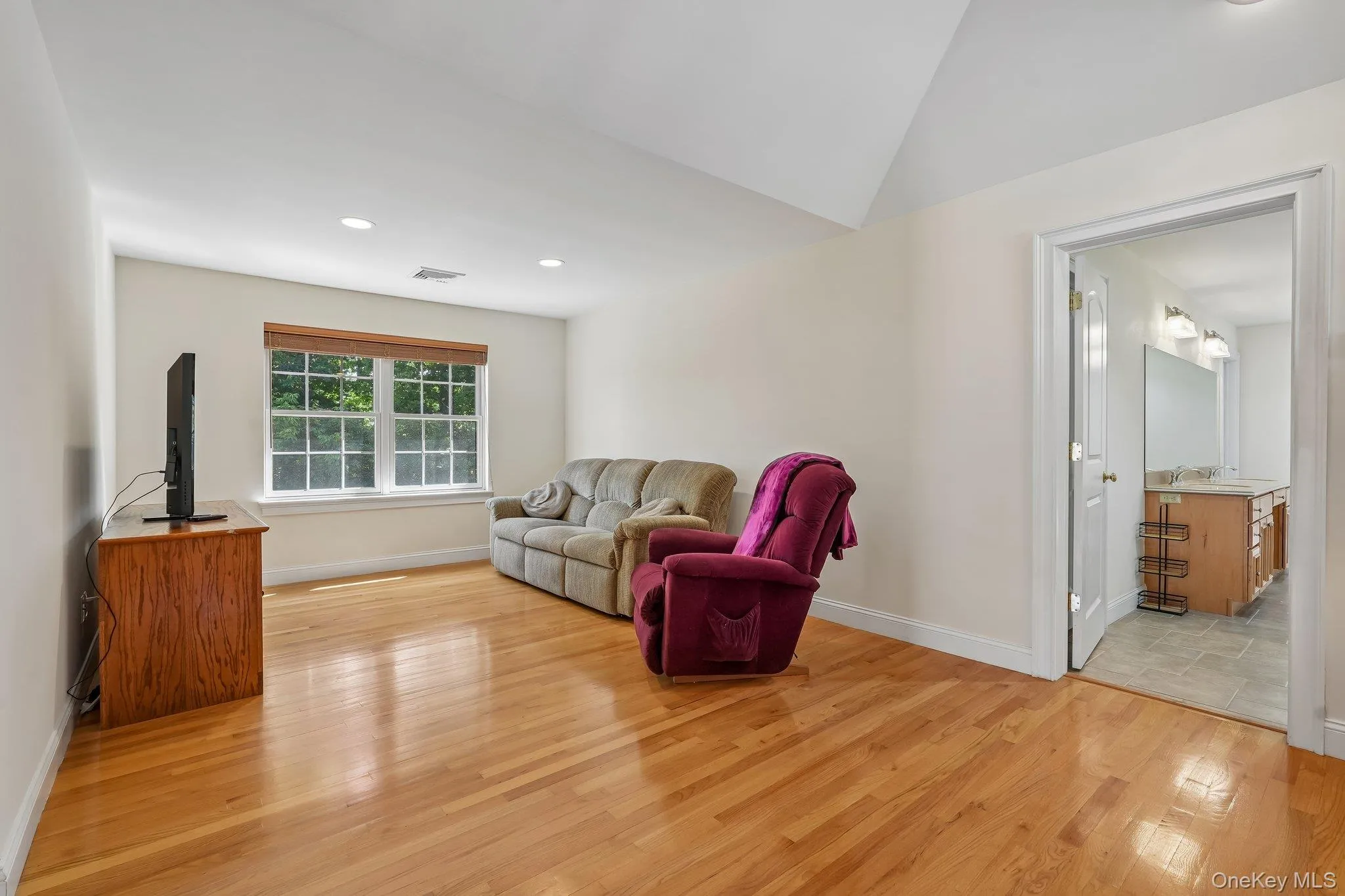 Primary bedroom has separate sitting area. Primary bedroom has separate sitting area.