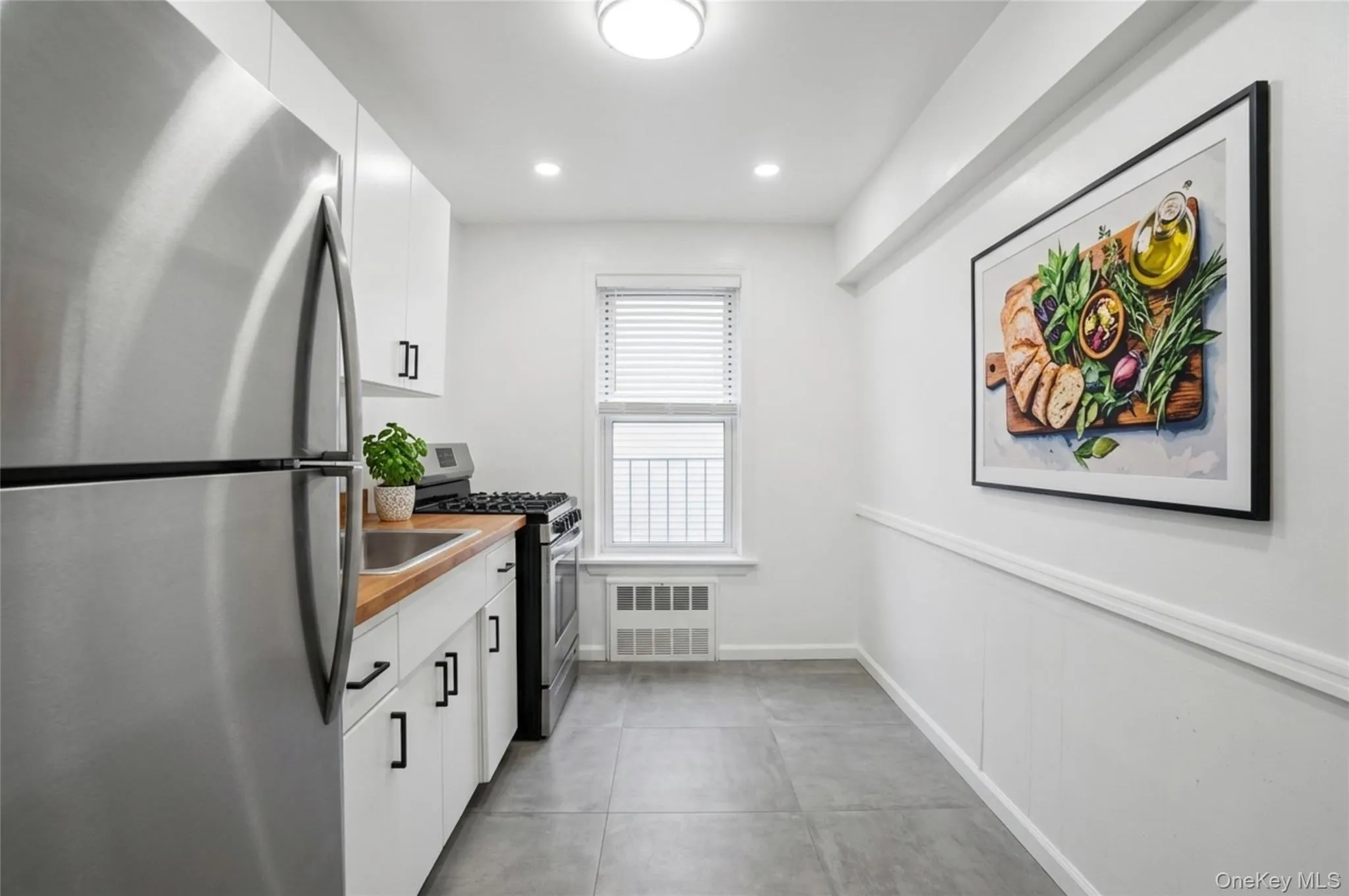 Idea for the kitchen's potential - staged. Idea for the kitchen's potential - staged.