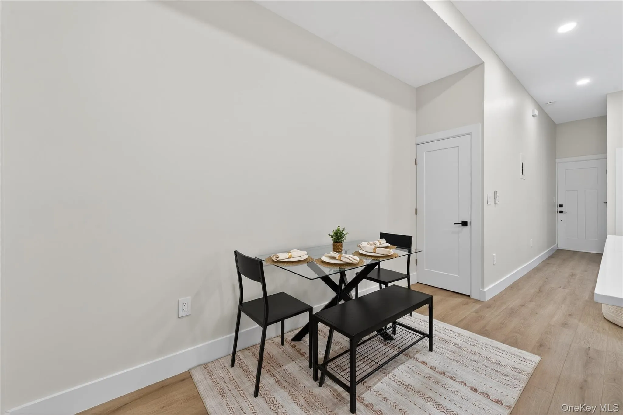 Light wood-finish flooring complements the neutral wall color Light wood-finish flooring complements the neutral wall color