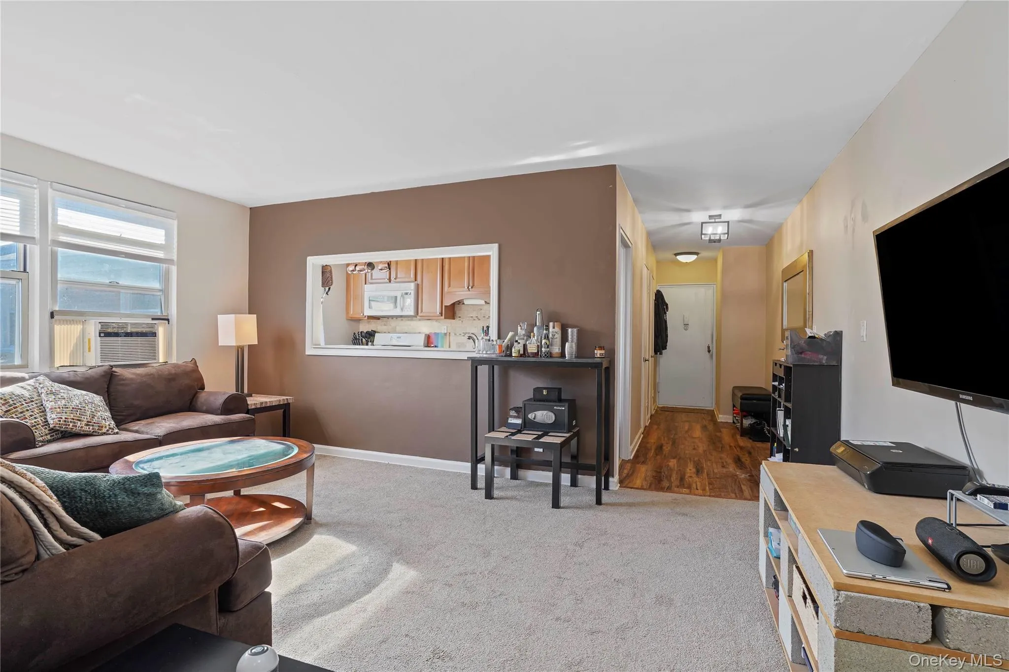 Spacious & Sunny Living Room With Pass Through To Kitchen Spacious & Sunny Living Room With Pass Through To Kitchen