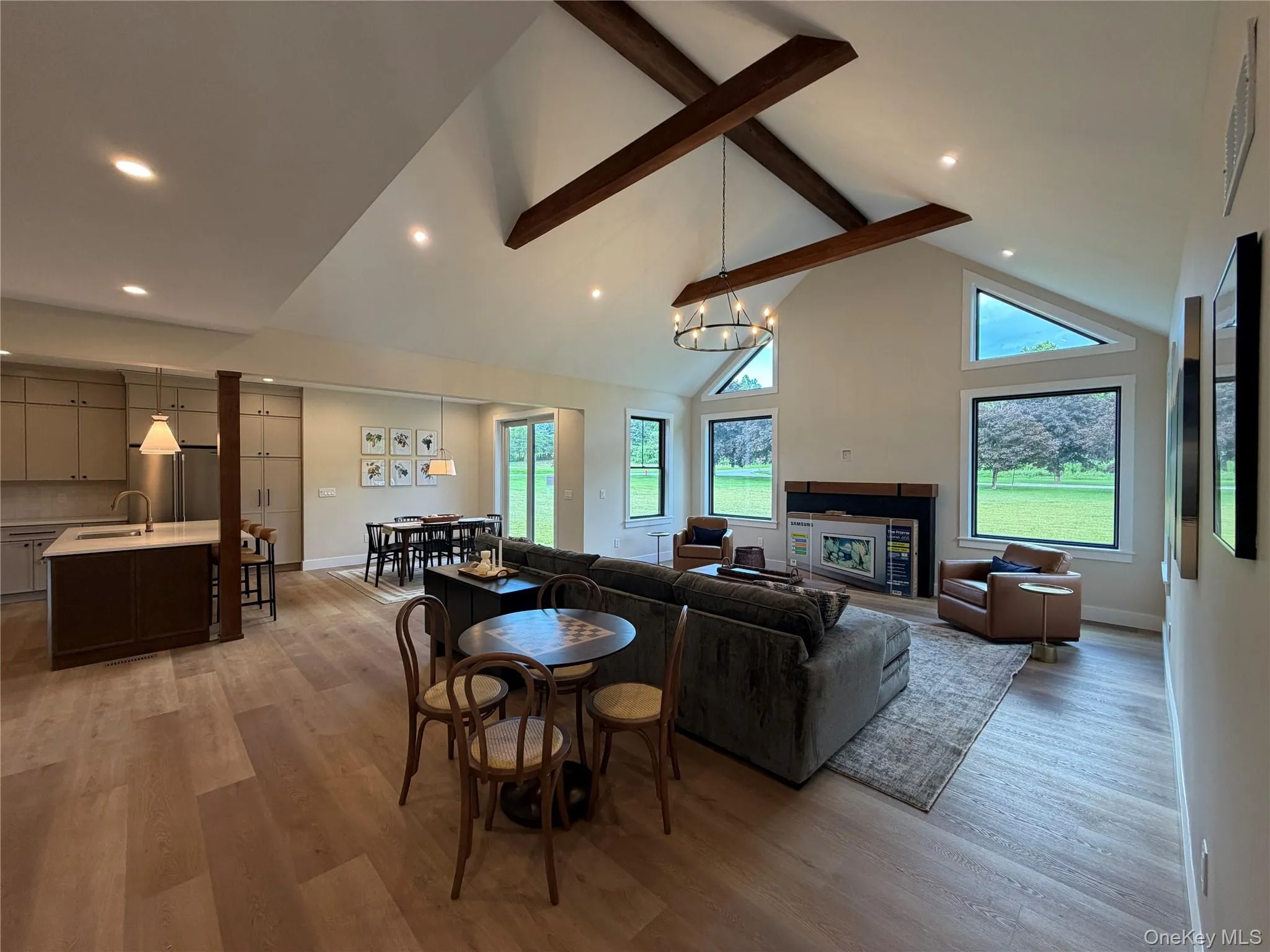 The heart of the home is this great room with open concept to the kitchen and dining area. The heart of the home is this great room with open concept to the kitchen and dining area.