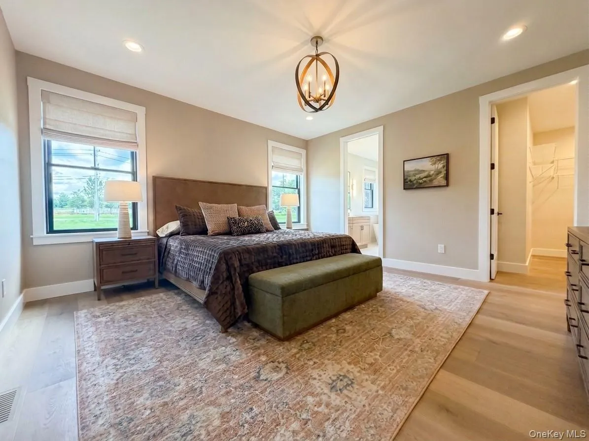Located on the 1st floor, this spacious Primary Suite has it all. Located on the 1st floor, this spacious Primary Suite has it all.