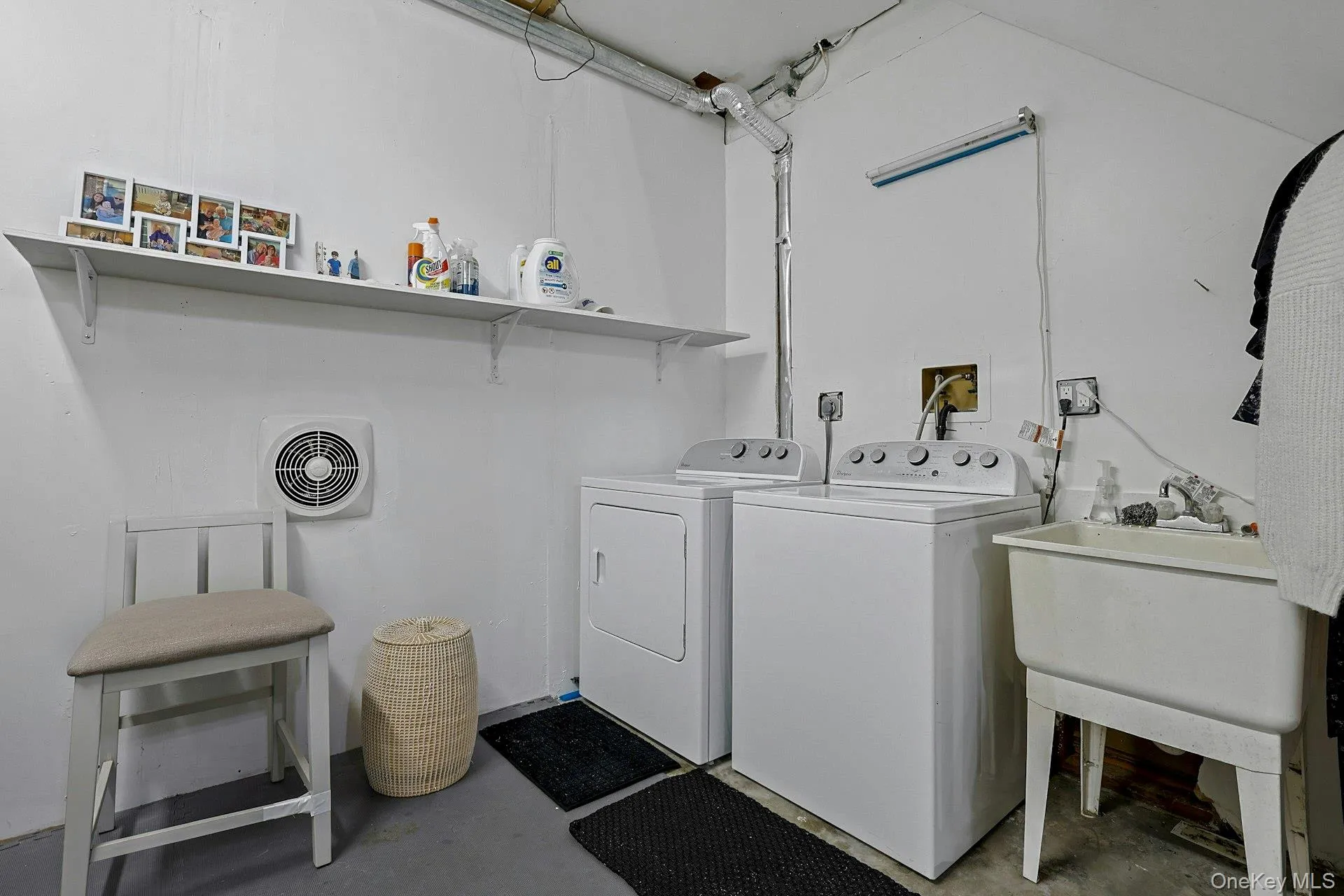 Laundry/utilities and storage area. Laundry/utilities and storage area.