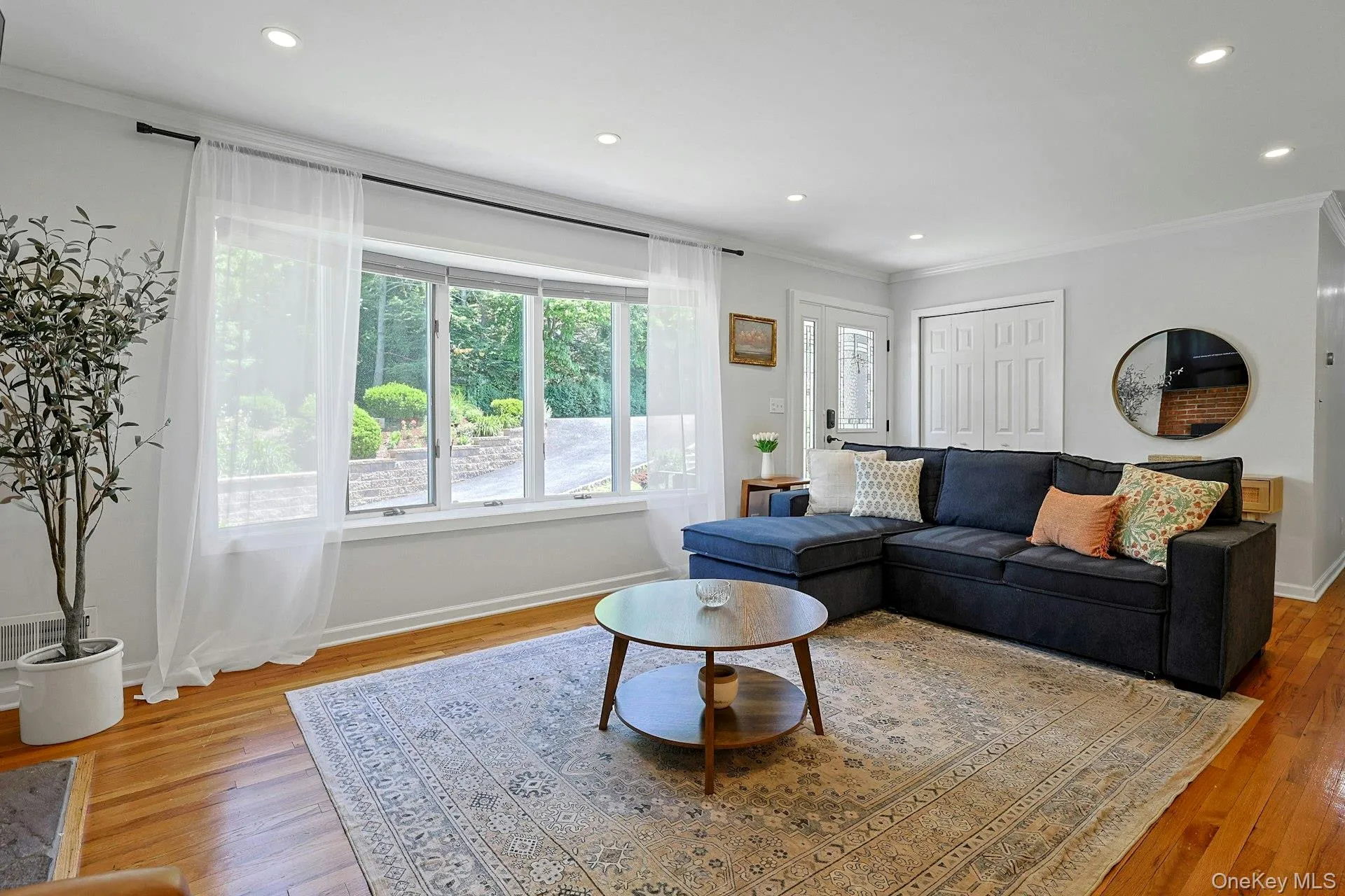 Living Room, plenty of sunlight coming through a good size bow window. Living Room, plenty of sunlight coming through a good size bow window.