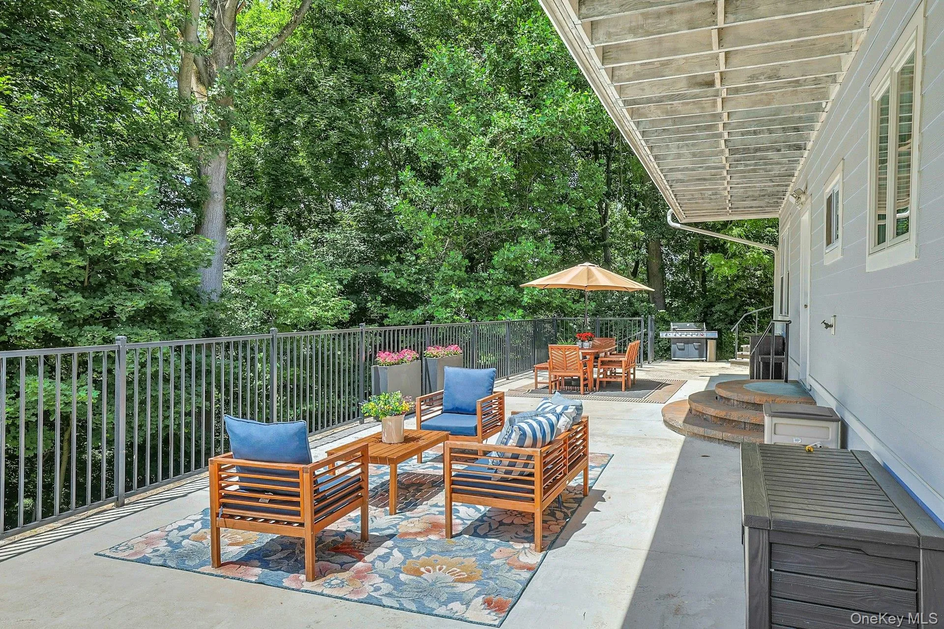 This expansive lower level patio can be accessible from either lower level or outside pathway. This expansive lower level patio can be accessible from either lower level or outside pathway.