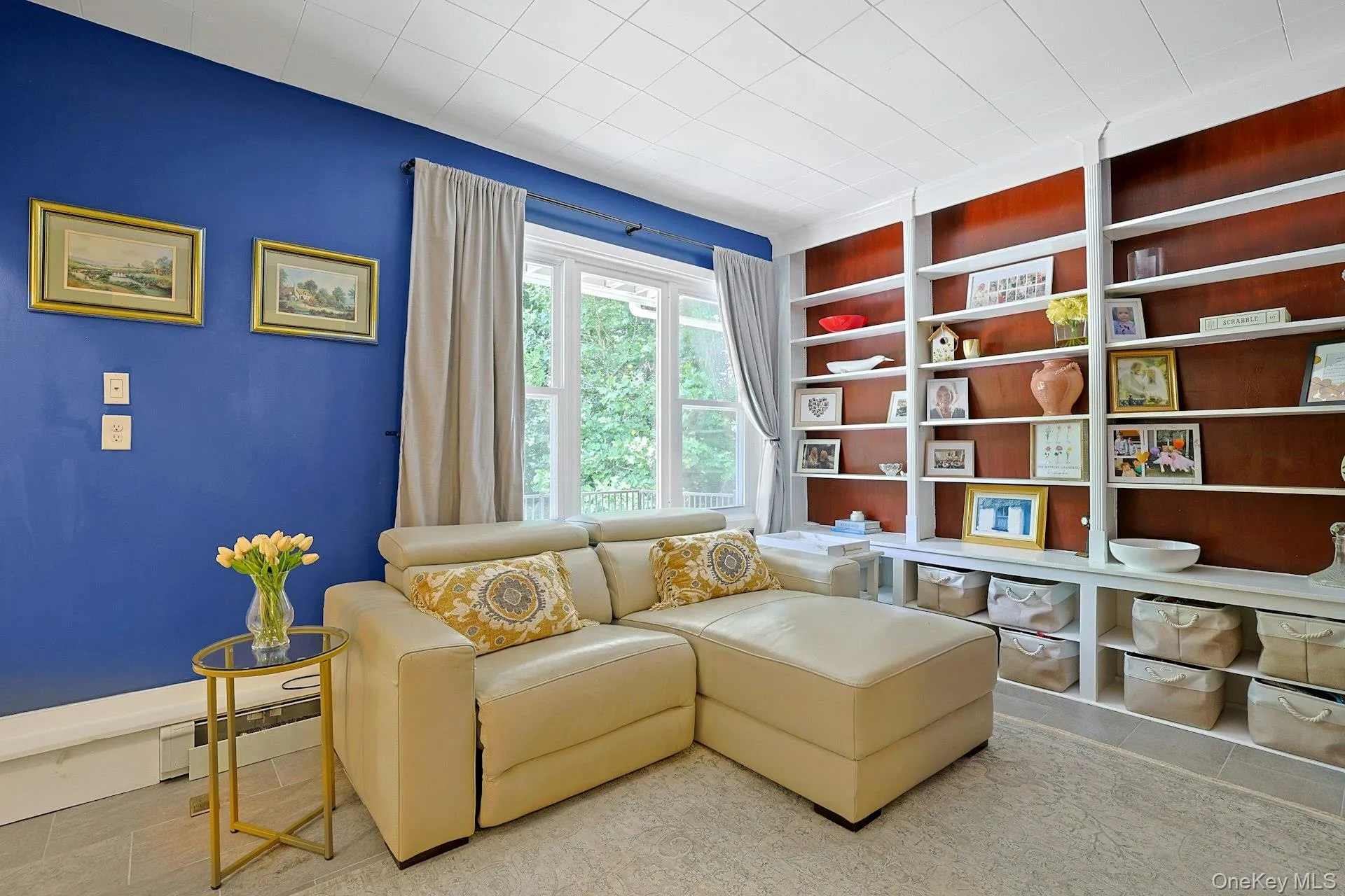 Library with built-in shelves for added convenience. Library with built-in shelves for added convenience.