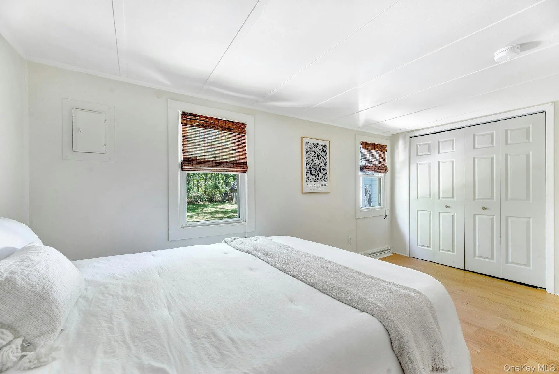 Primary bedroom with dual closets and backyard views. Primary bedroom with dual closets and backyard views.