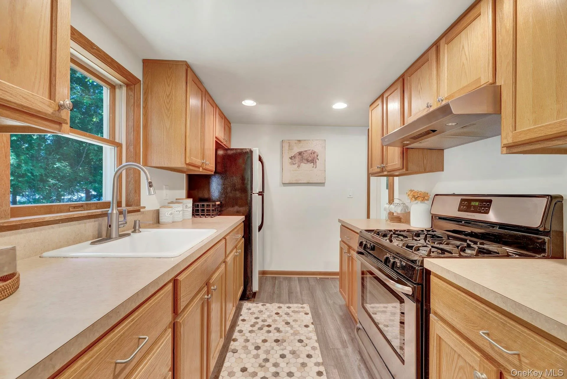 Bright eat in kitchen offering ample cabinetry and move in ready. Bright eat in kitchen offering ample cabinetry and move in ready.