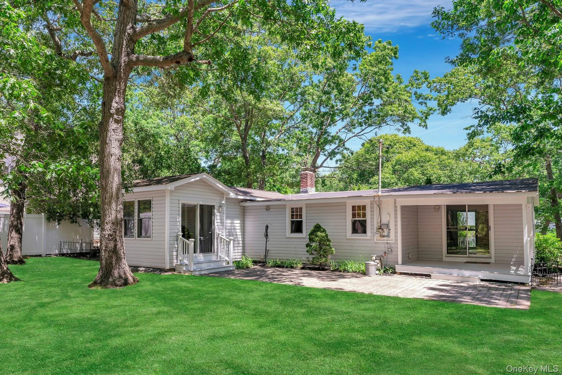 The spacious backyard offers room for summer barbecues, lawn games, evenings around a fire pit, or simply relaxing beneath the stars. The spacious backyard offers room for summer barbecues, lawn games, evenings around a fire pit, or simply relaxing beneath the stars.