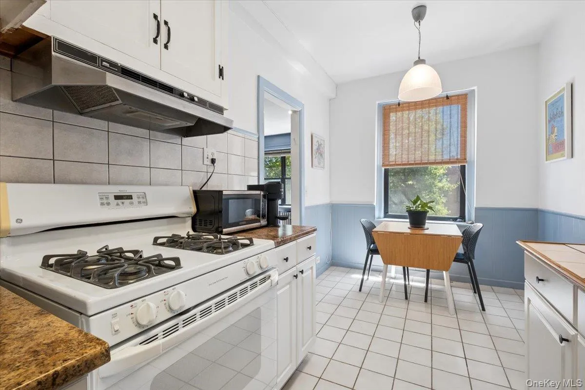 Eat-in-kitchen has dining area near window Eat-in-kitchen has dining area near window
