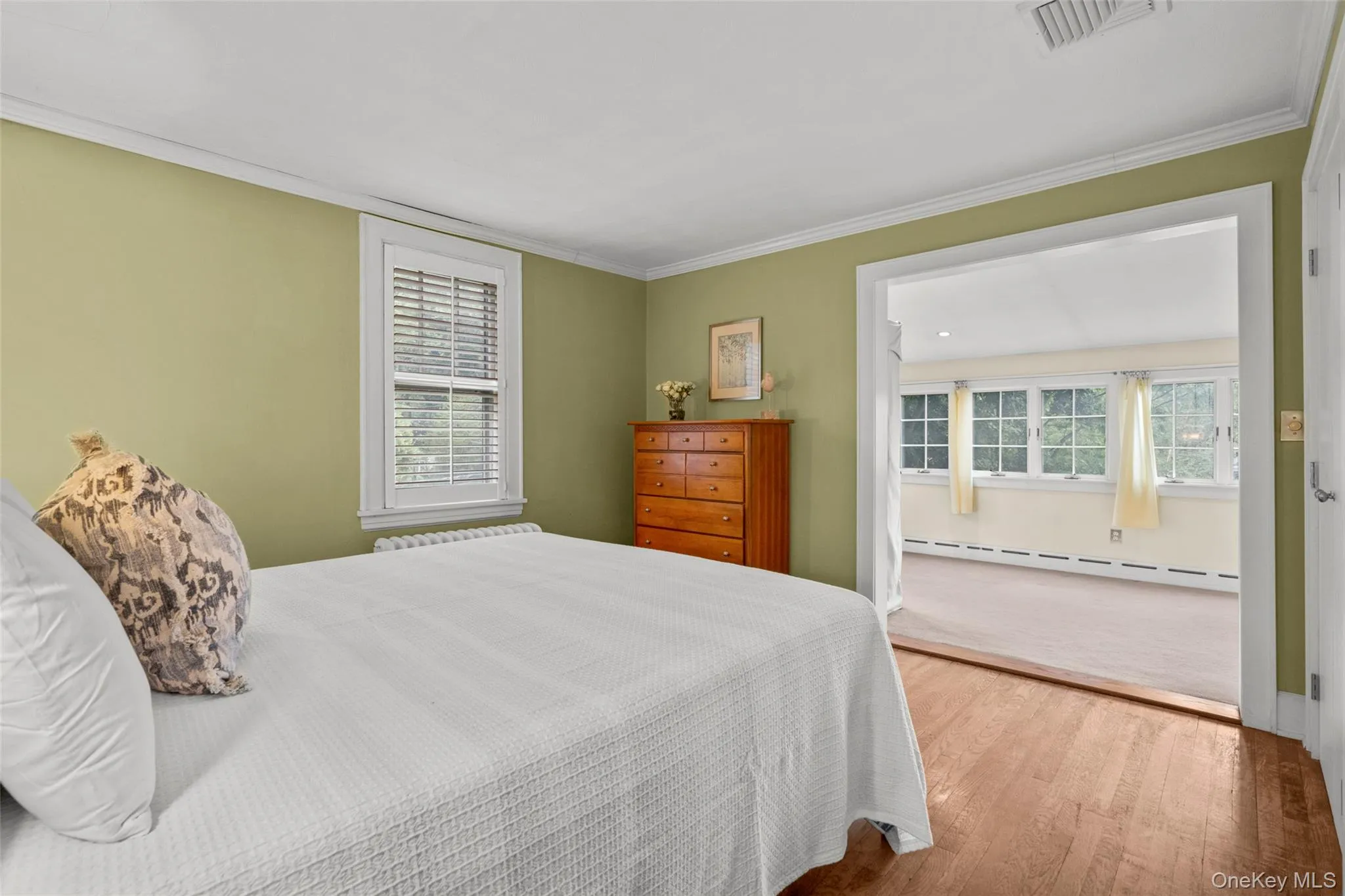 Primary bedroom with a closet and a second oversized, deep closet; bonus space that can be used as an office, gym, or dressing room, with potential for a future primary bathroom. Primary bedroom with a closet and a second oversized, deep closet; bonus space that can be used as an office, gym, or dressing room, with potential for a future primary bathroom.