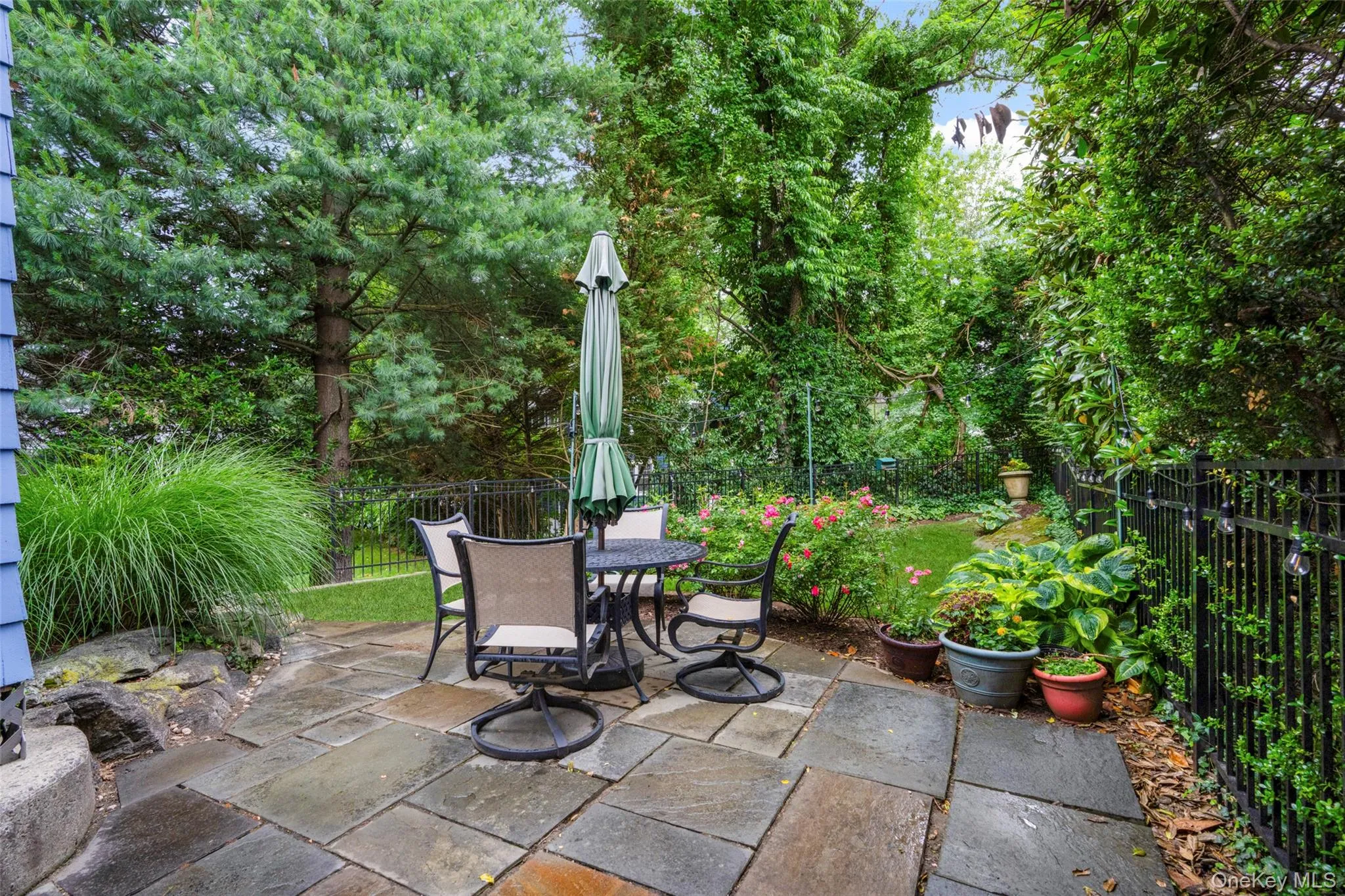 Set on a landscaped 0.11-acre property with mature plantings and a private bluestone patio, this home enjoys a highly desirable Larchmont location. Set on a landscaped 0.11-acre property with mature plantings and a private bluestone patio, this home enjoys a highly desirable Larchmont location.