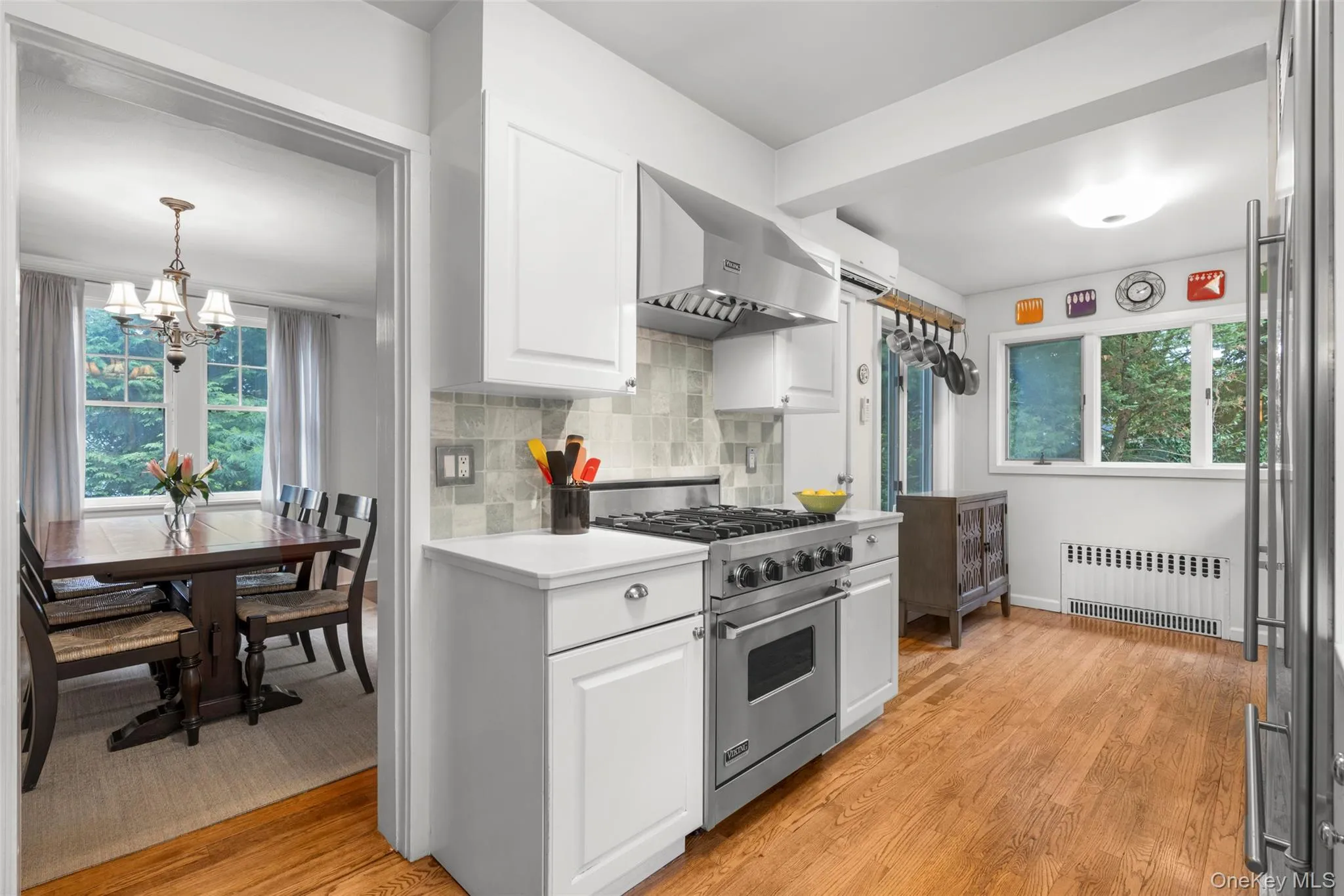 Eat-in kitchen with stainless steel appliances. Eat-in kitchen with stainless steel appliances.