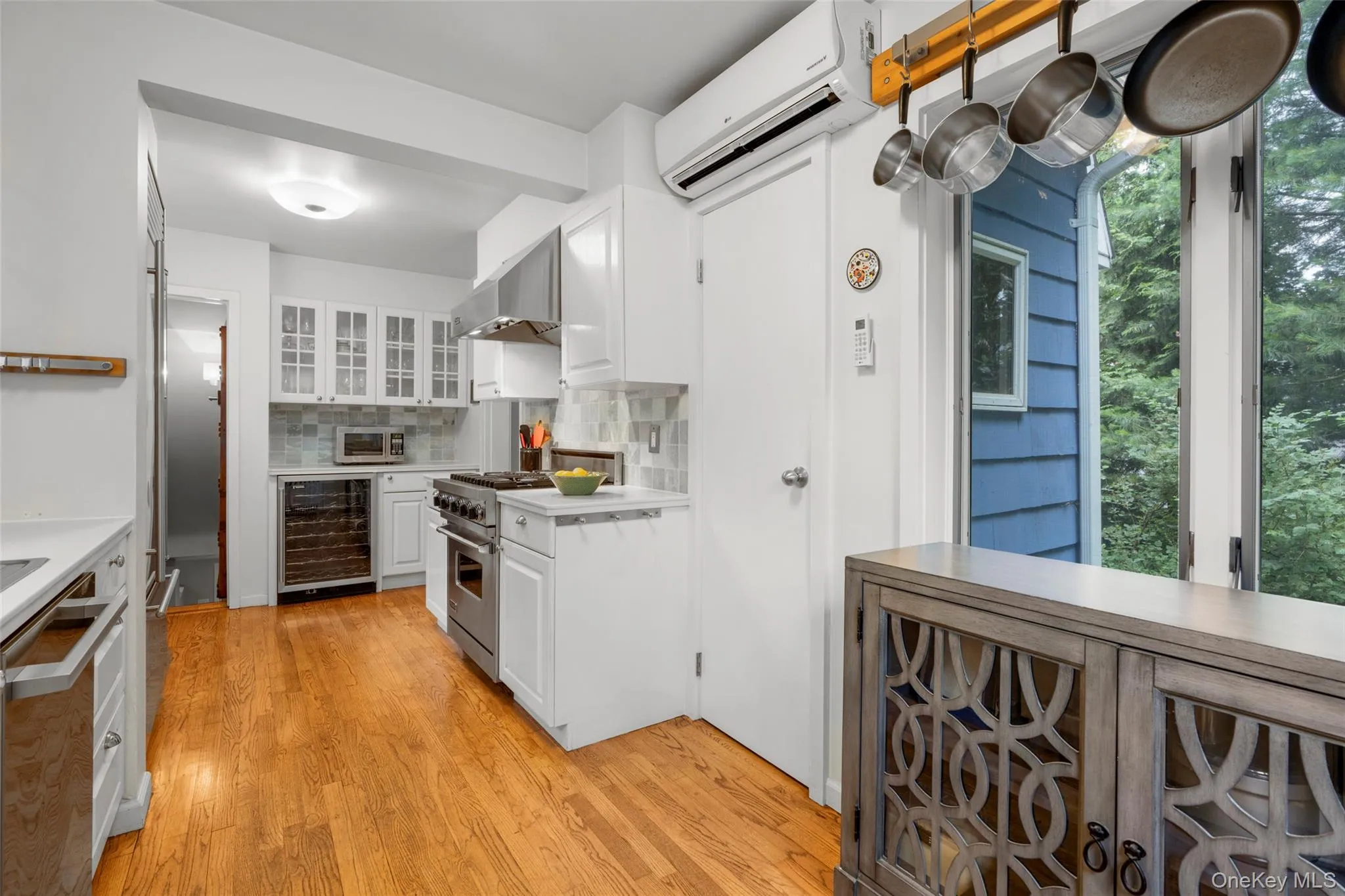 Eat-in kitchen with stainless steel appliances. Eat-in kitchen with stainless steel appliances.