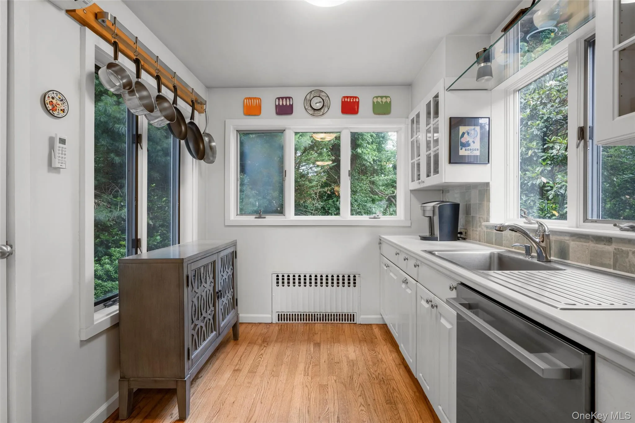 Eat-in kitchen with stainless steel appliances. Eat-in kitchen with stainless steel appliances.