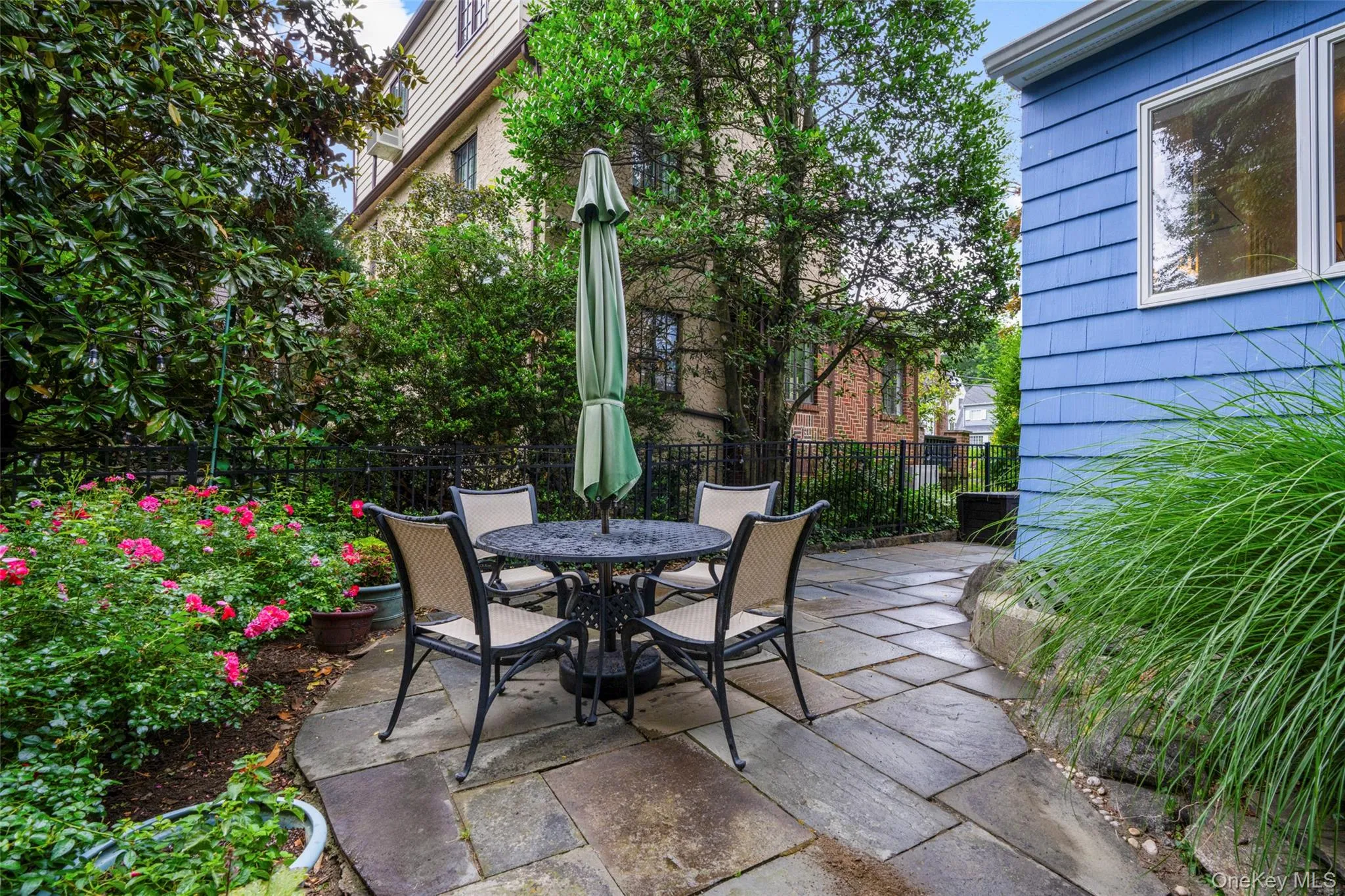 Set on a landscaped 0.11-acre property with mature plantings and a private bluestone patio, this home enjoys a highly desirable Larchmont location. Set on a landscaped 0.11-acre property with mature plantings and a private bluestone patio, this home enjoys a highly desirable Larchmont location.