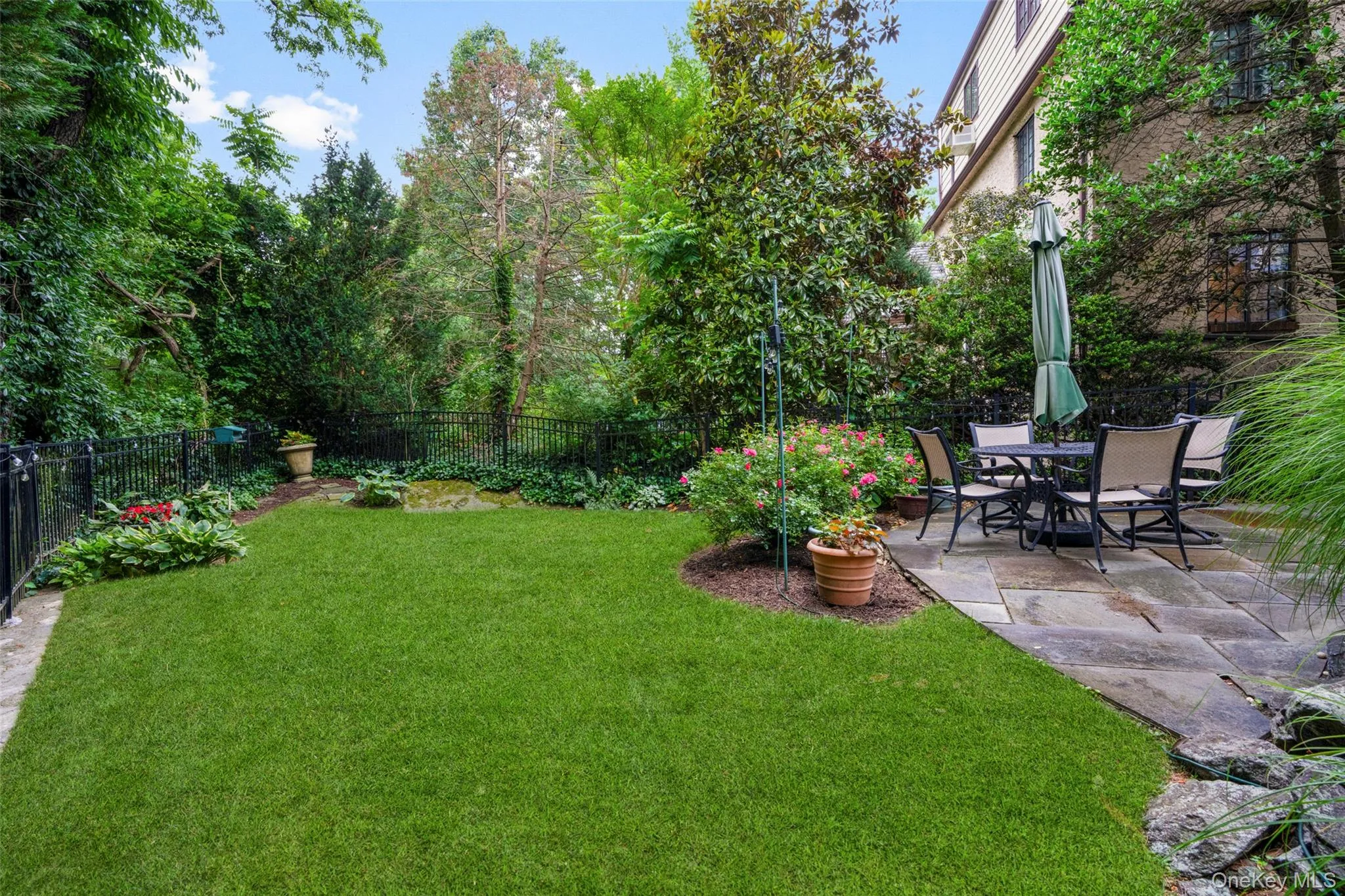 Set on a landscaped 0.11-acre property with mature plantings and a private bluestone patio, this home enjoys a highly desirable Larchmont location. Set on a landscaped 0.11-acre property with mature plantings and a private bluestone patio, this home enjoys a highly desirable Larchmont location.