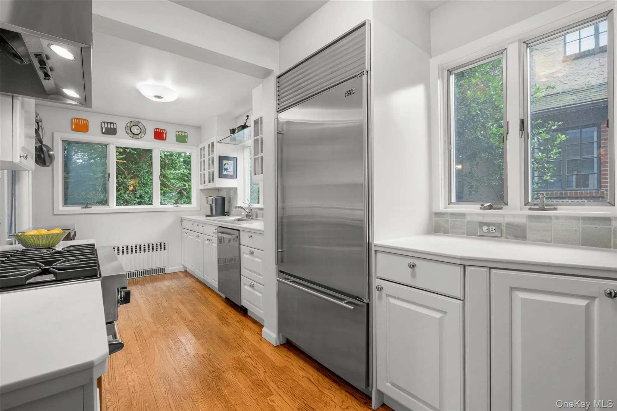 Eat-in kitchen with stainless steel appliances. Eat-in kitchen with stainless steel appliances.