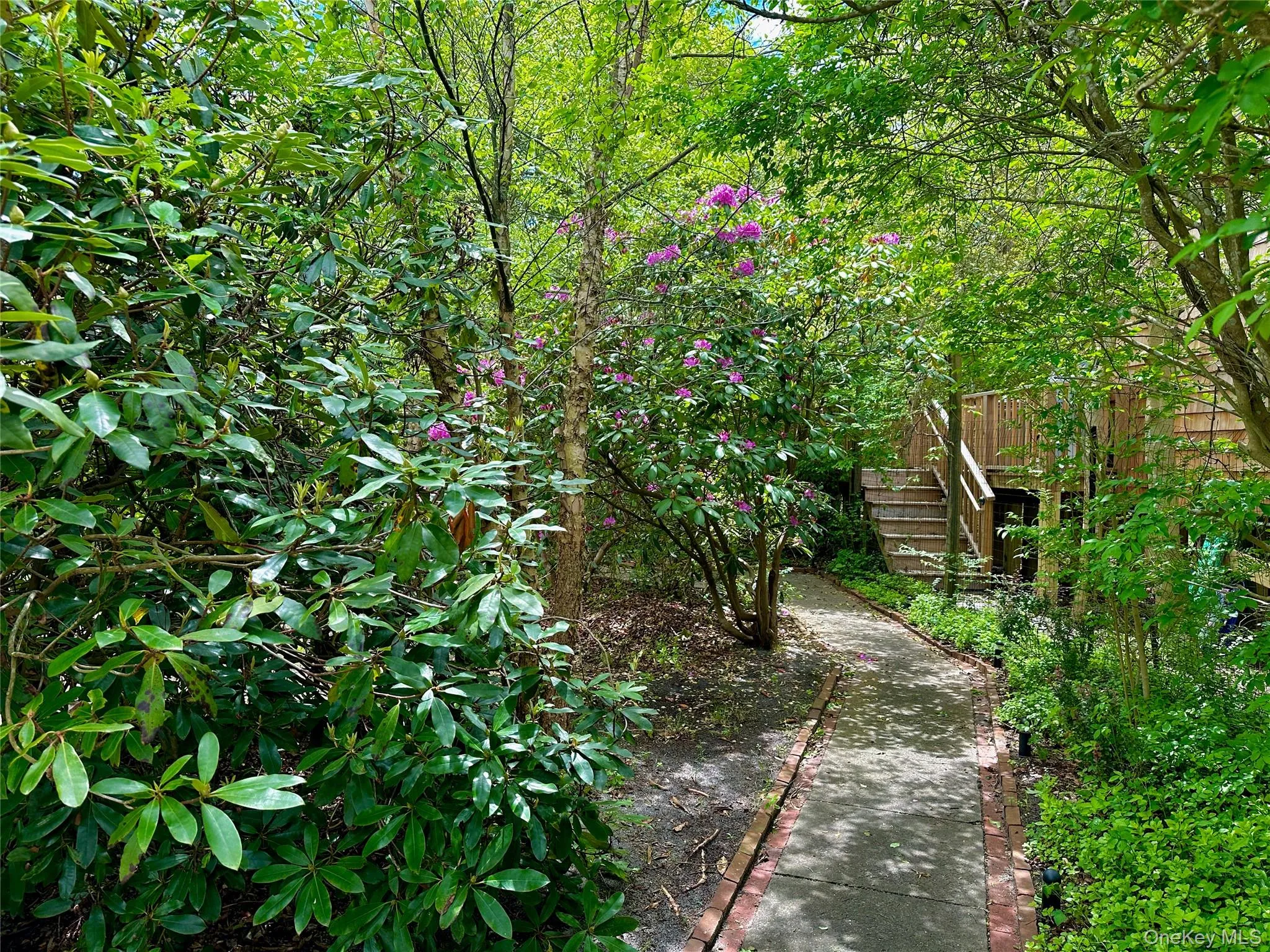 View of yard featuring stairs View of yard featuring stairs