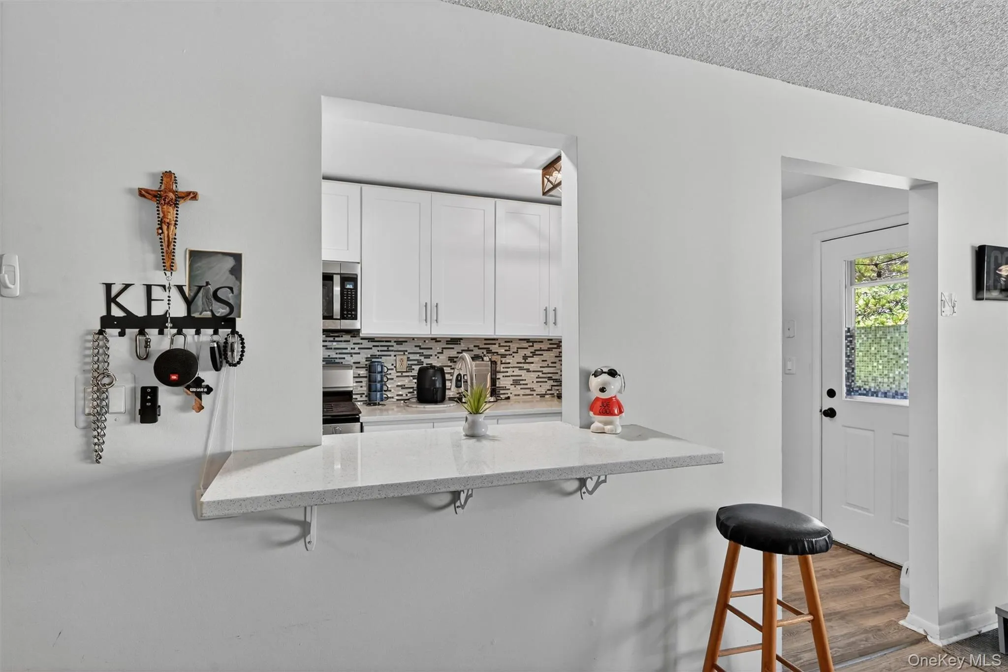 Countertop seating. Kitchen opens into the living room. Countertop seating. Kitchen opens into the living room.