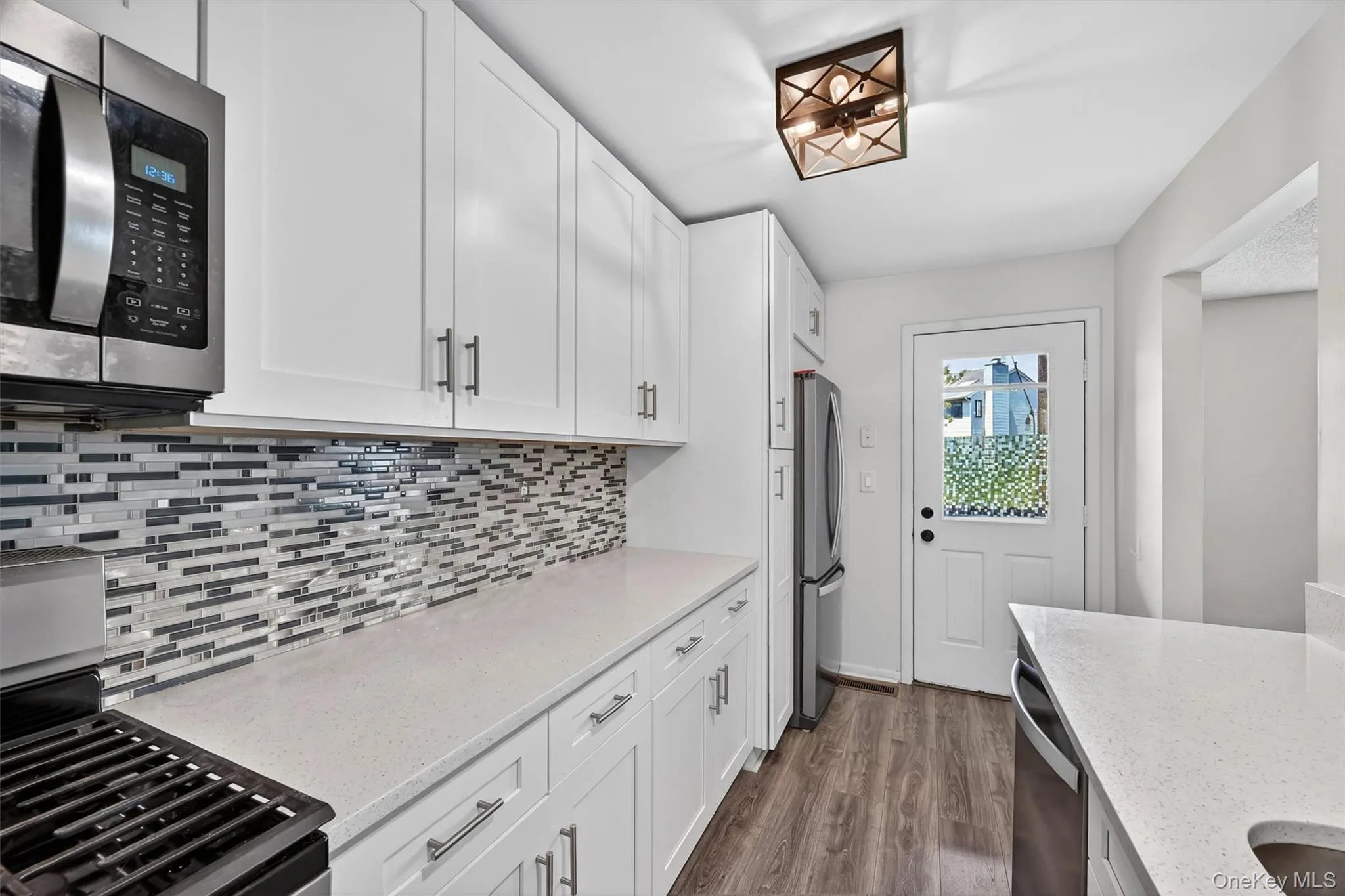 Custom Kitchen with generous storage space. Custom Kitchen with generous storage space.