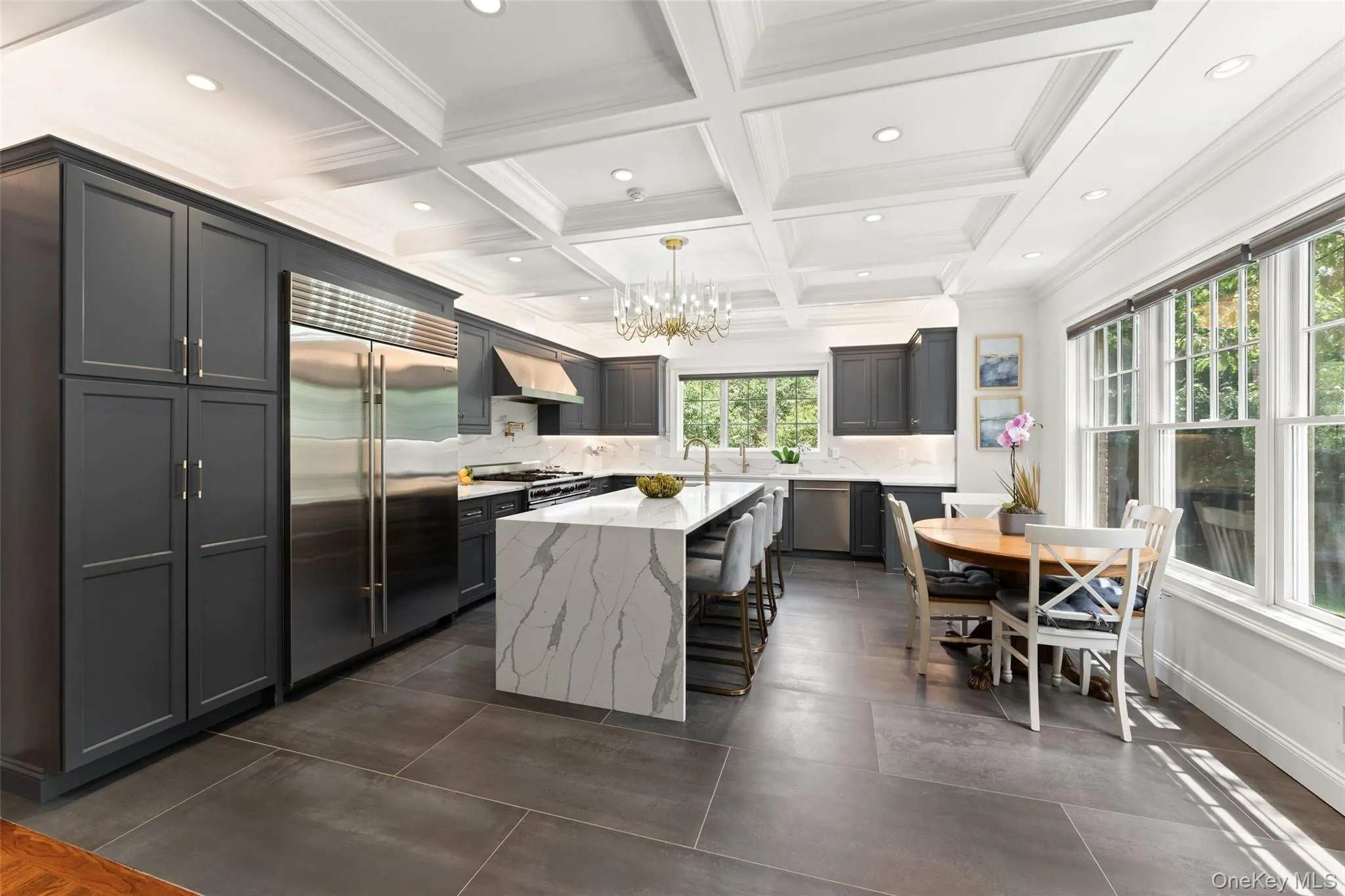 Kitchen with Wolf stove top, Sub Zero refrigerator, Asco dishwasher and built in wine refrigator Kitchen with Wolf stove top, Sub Zero refrigerator, Asco dishwasher and built in wine refrigator