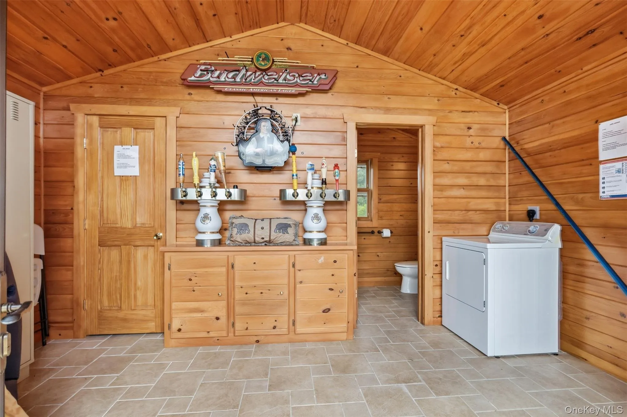 Pool House with Taproom, full bathroom, and storage lockers Pool House with Taproom, full bathroom, and storage lockers
