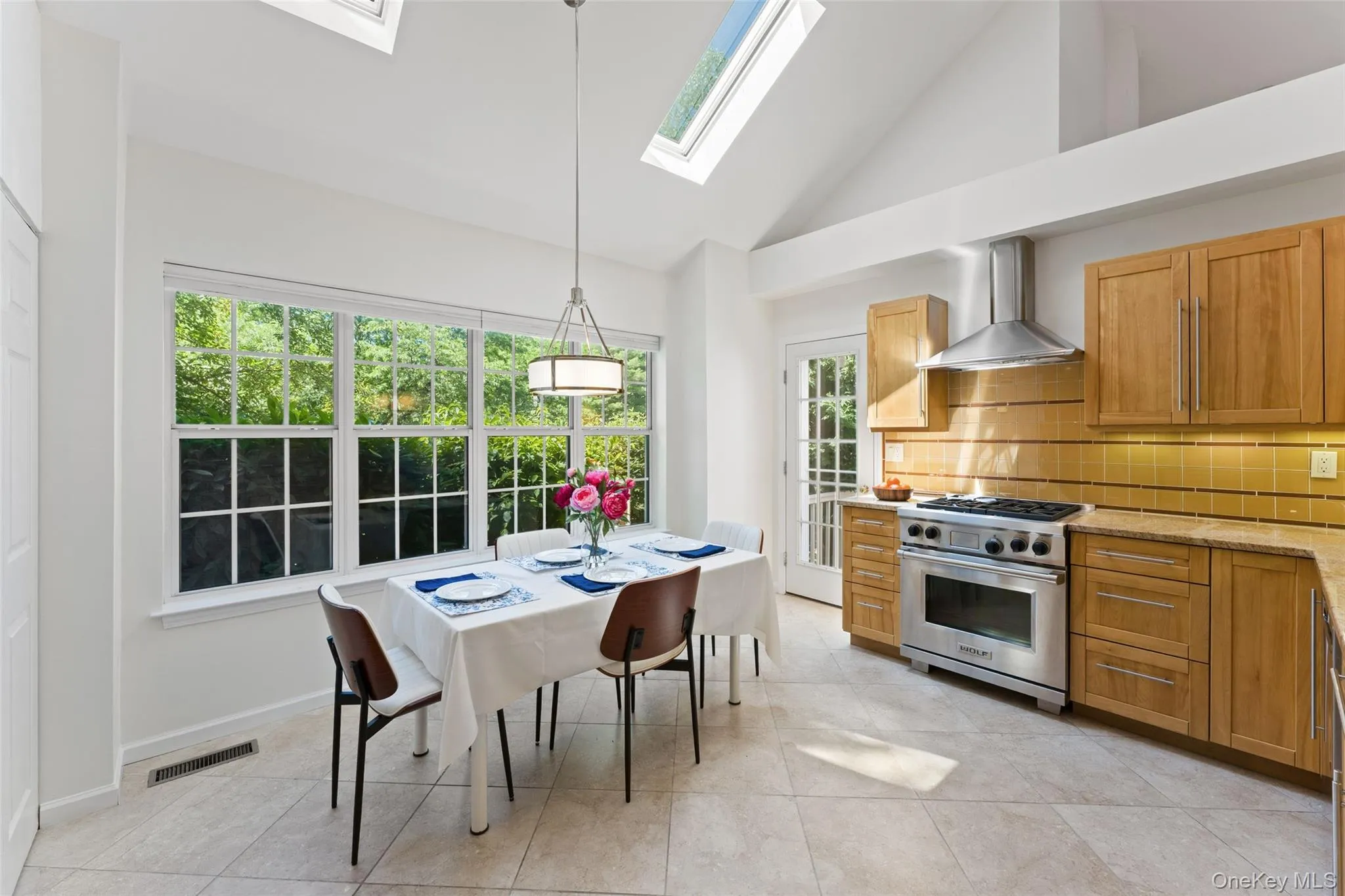 Alternate View of Kitchen with Tons of Natural Light and Door to Deck Alternate View of Kitchen with Tons of Natural Light and Door to Deck