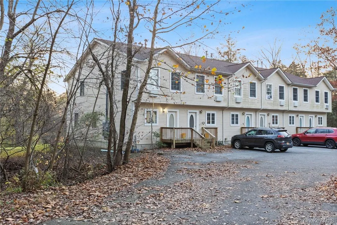 Two parking spaces in front of the townhouse conveniently located Two parking spaces in front of the townhouse conveniently located