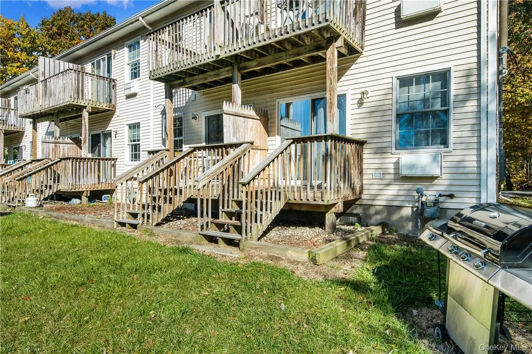 Deck to backyard and lake views Deck to backyard and lake views