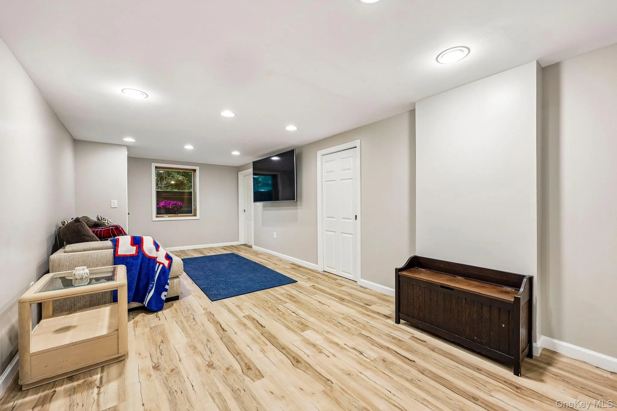 Family room as an egress window with steps leading outside Family room as an egress window with steps leading outside