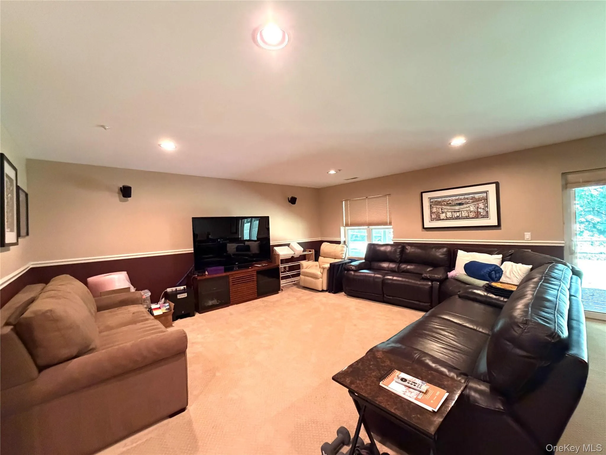 Huge above ground finished basement with sliding glass doors to backyard Huge above ground finished basement with sliding glass doors to backyard