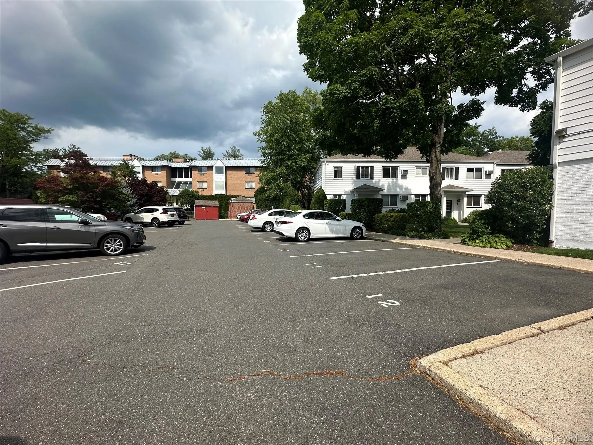 Private parking lot at back of community. #129 is first building. Walk to your car in seconds. Private parking lot at back of community. #129 is first building. Walk to your car in seconds.