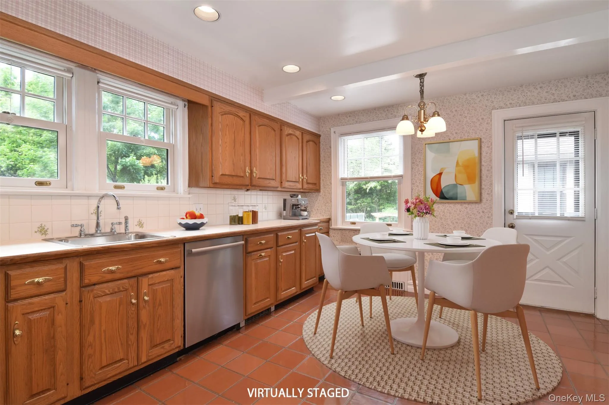Large eat-in-area with chandelier, three windows and side door Large eat-in-area with chandelier, three windows and side door