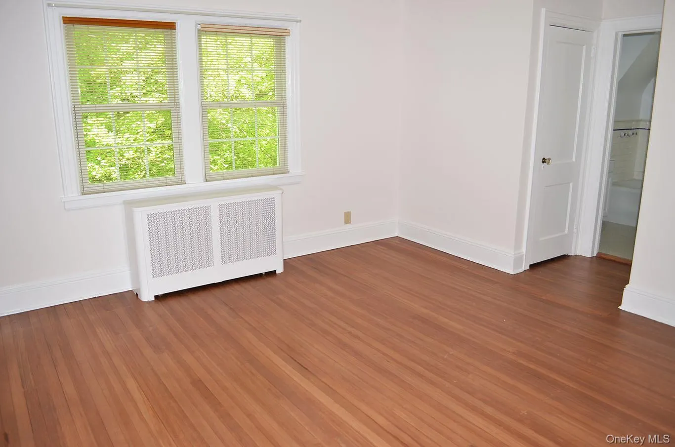 Spacious primary bedroom with two closets and full bath Spacious primary bedroom with two closets and full bath