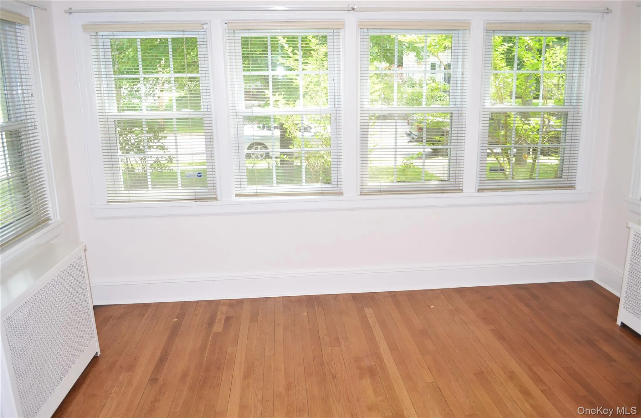 Sun filled den with hardwood floors Sun filled den with hardwood floors