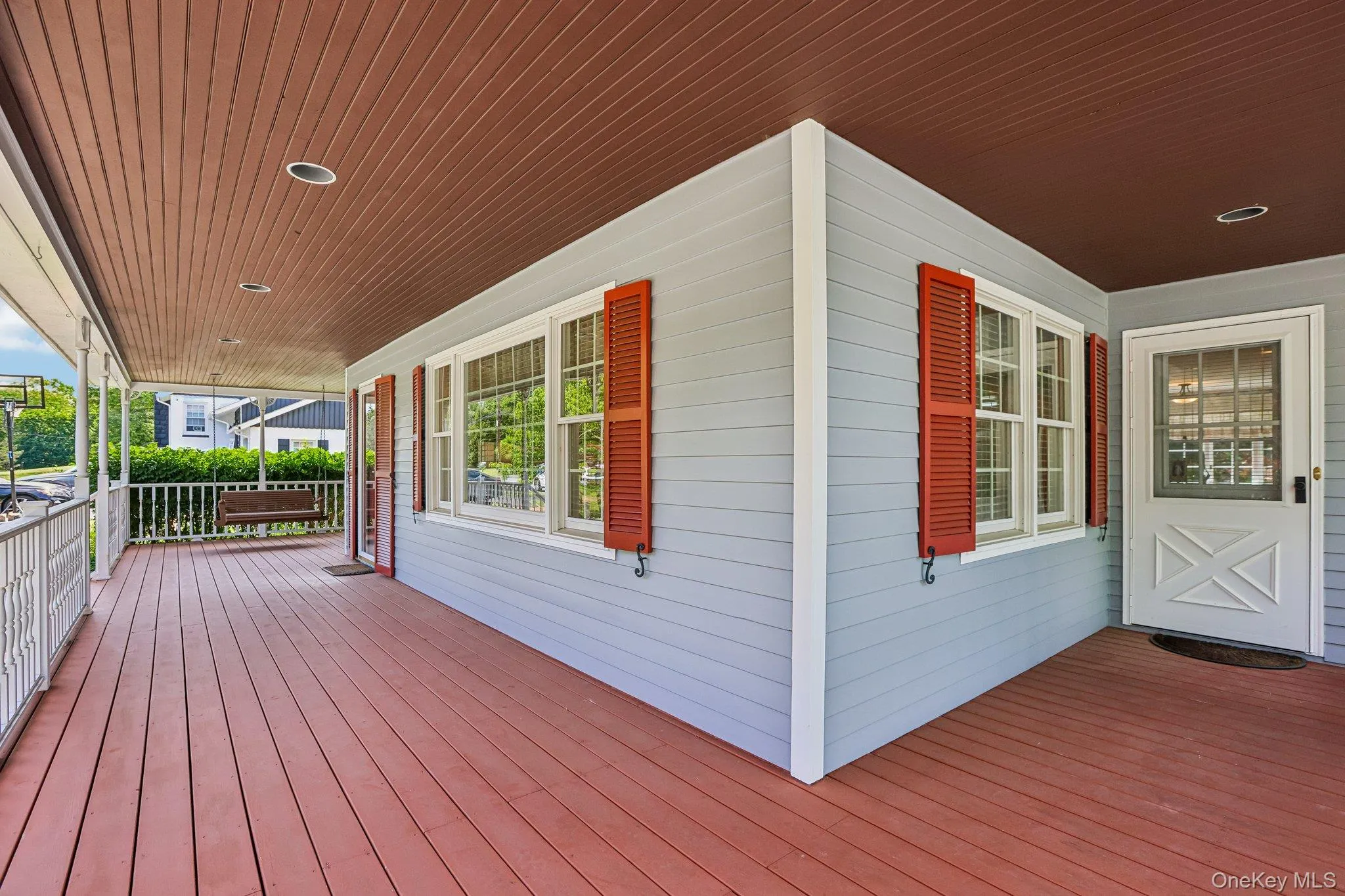Wrap around porch with door opening to kitchen Wrap around porch with door opening to kitchen