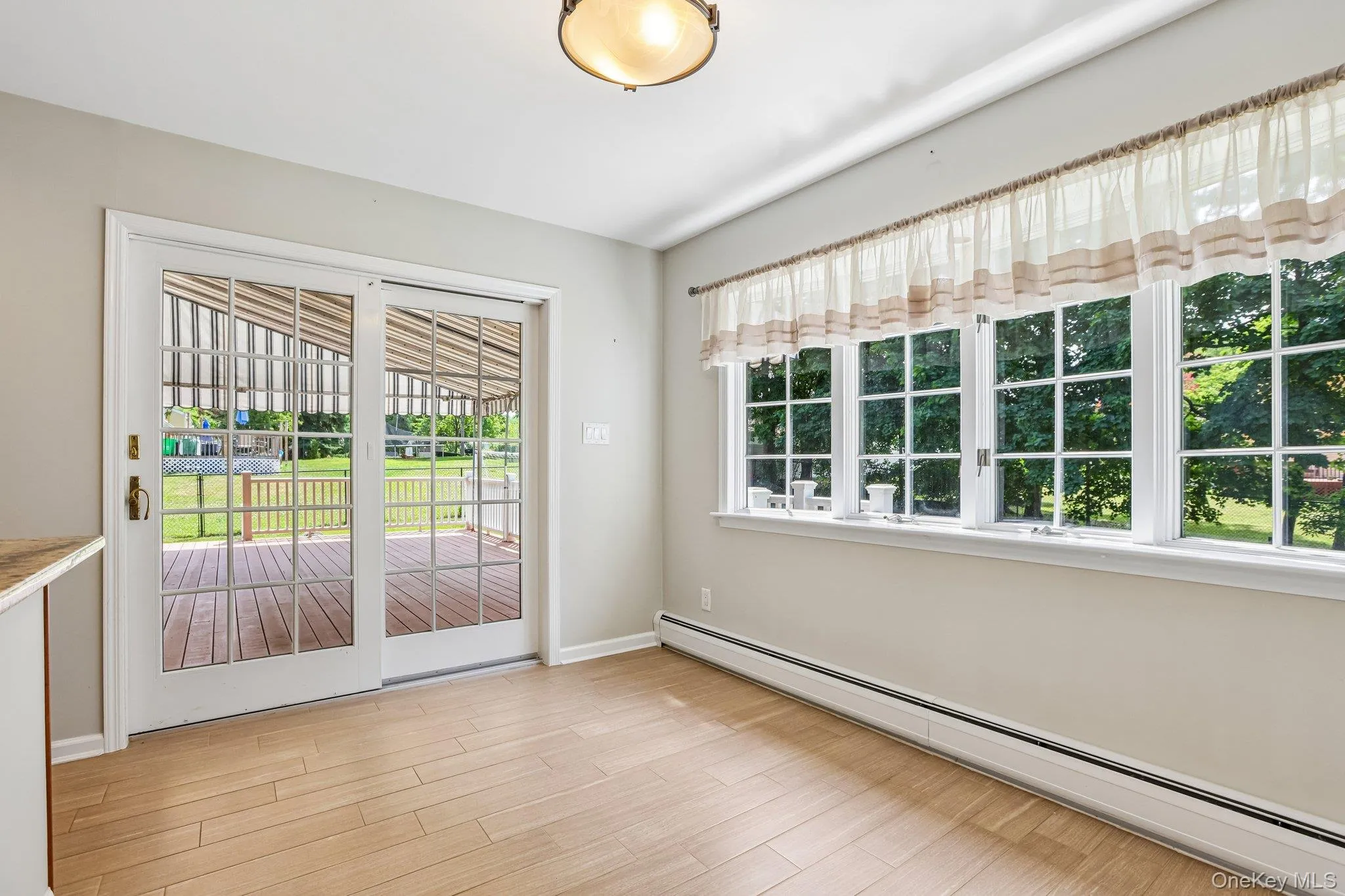Eat in area with doors to deck Eat in area with doors to deck