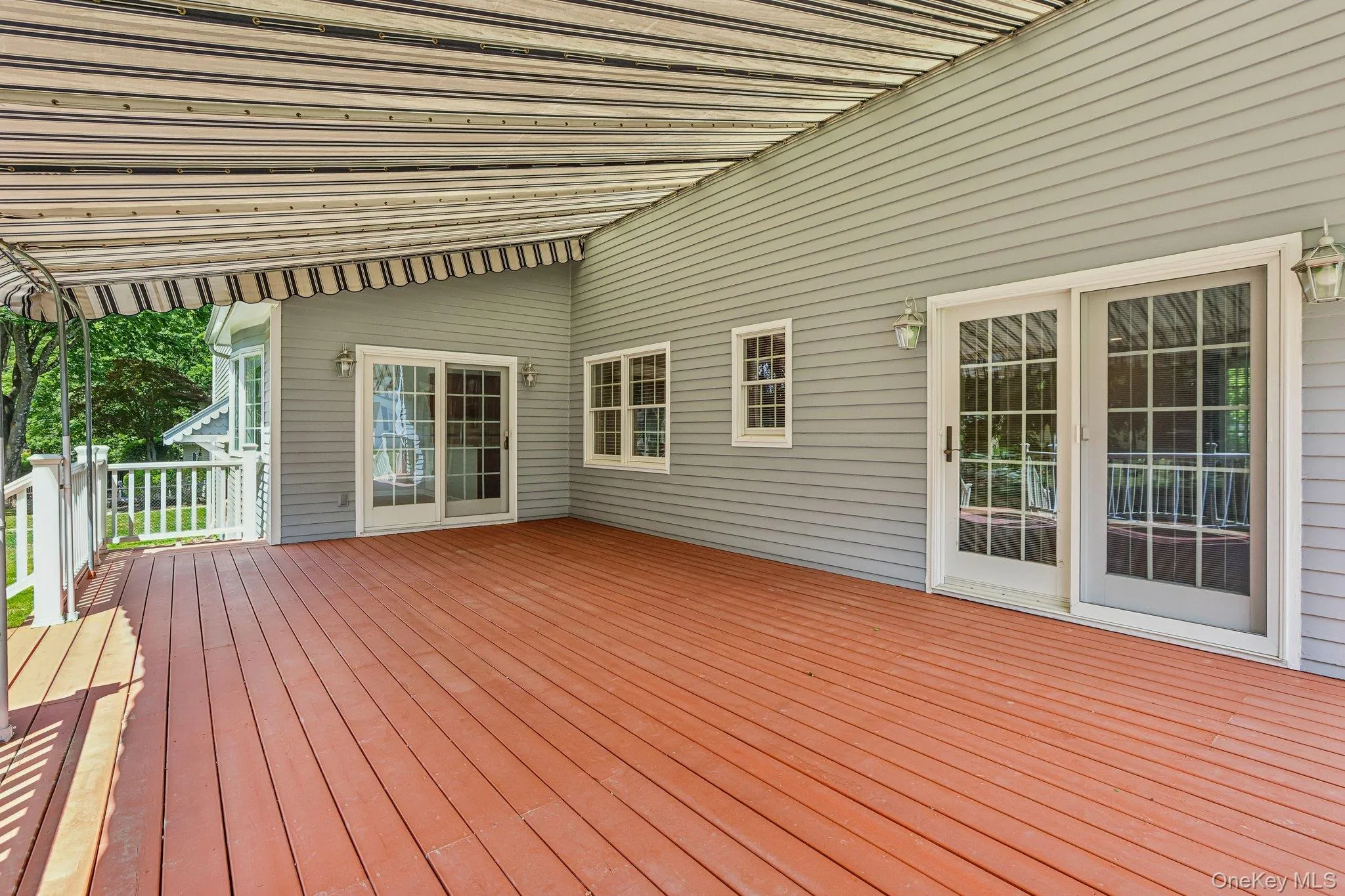 Deck with removable awning Deck with removable awning