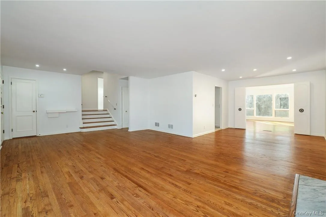 Living room with view of dining room and family room Living room with view of dining room and family room