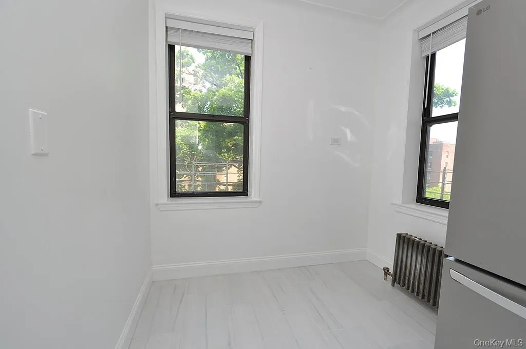 Renovated eat-in-kitchen with stainless steel appliances and quartz counters. Renovated eat-in-kitchen with stainless steel appliances and quartz counters.