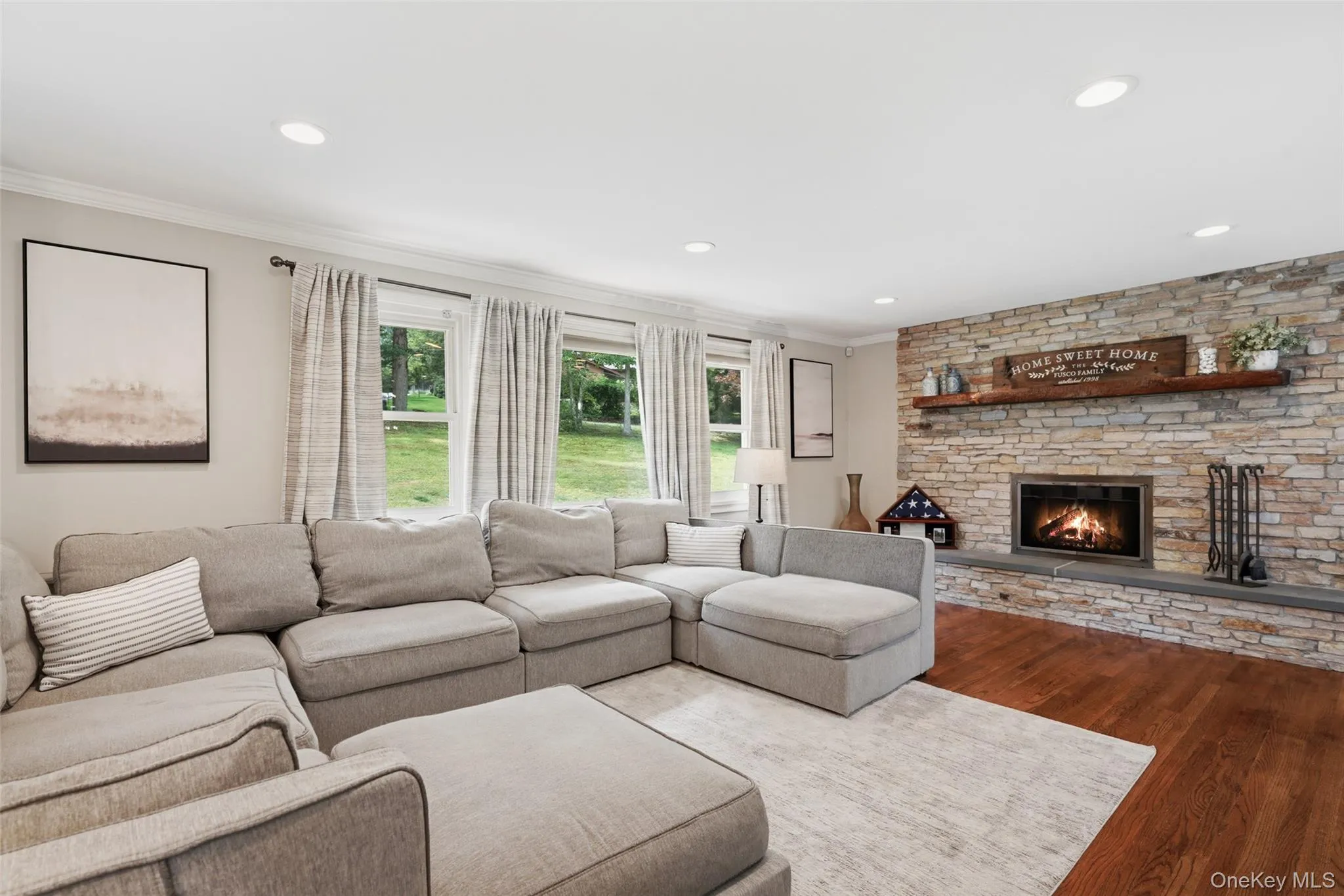 Formal living room with refinished brick wood-burning fireplace Formal living room with refinished brick wood-burning fireplace