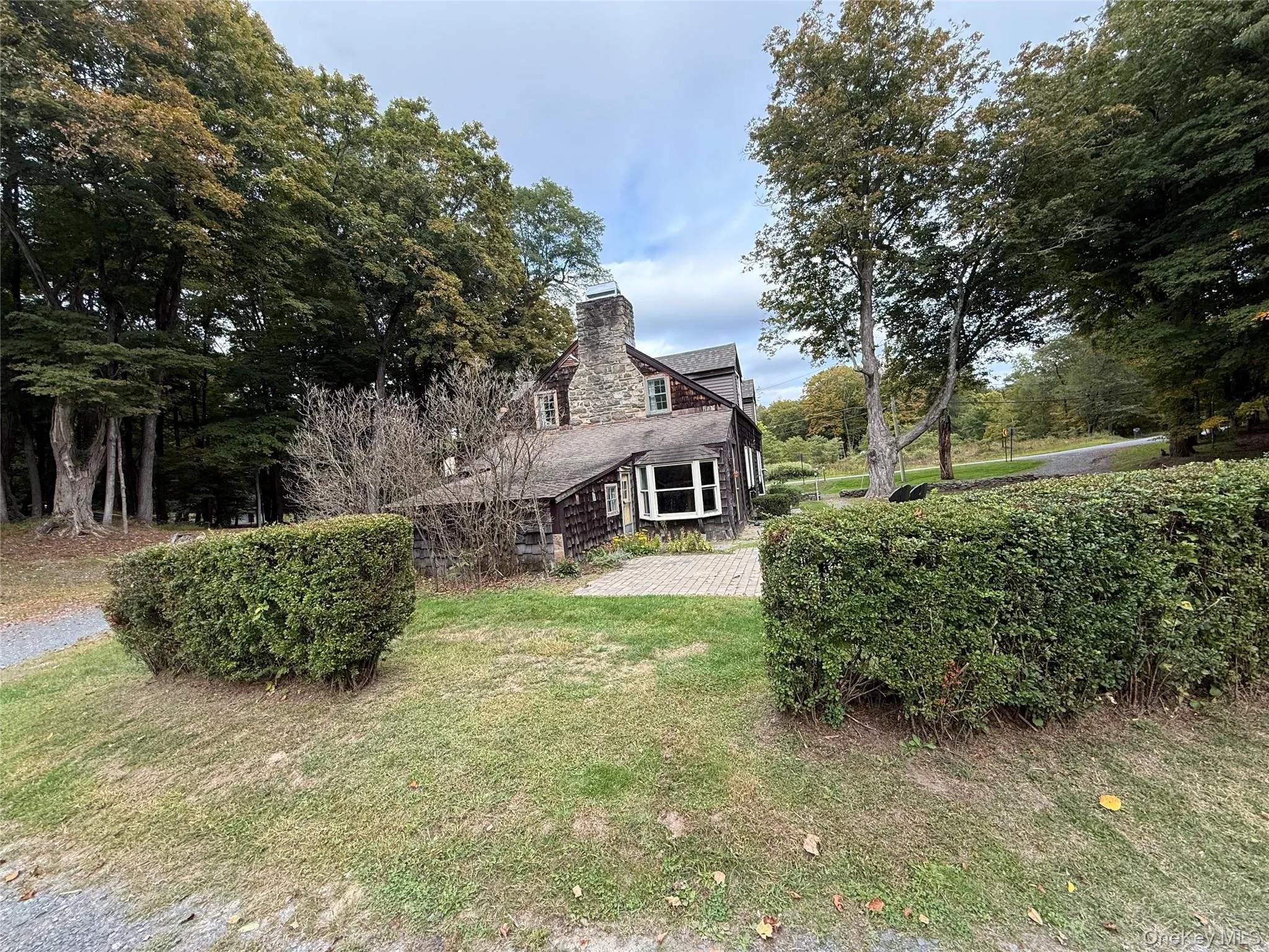 View of grassy yard featuring view of scattered trees View of grassy yard featuring view of scattered trees