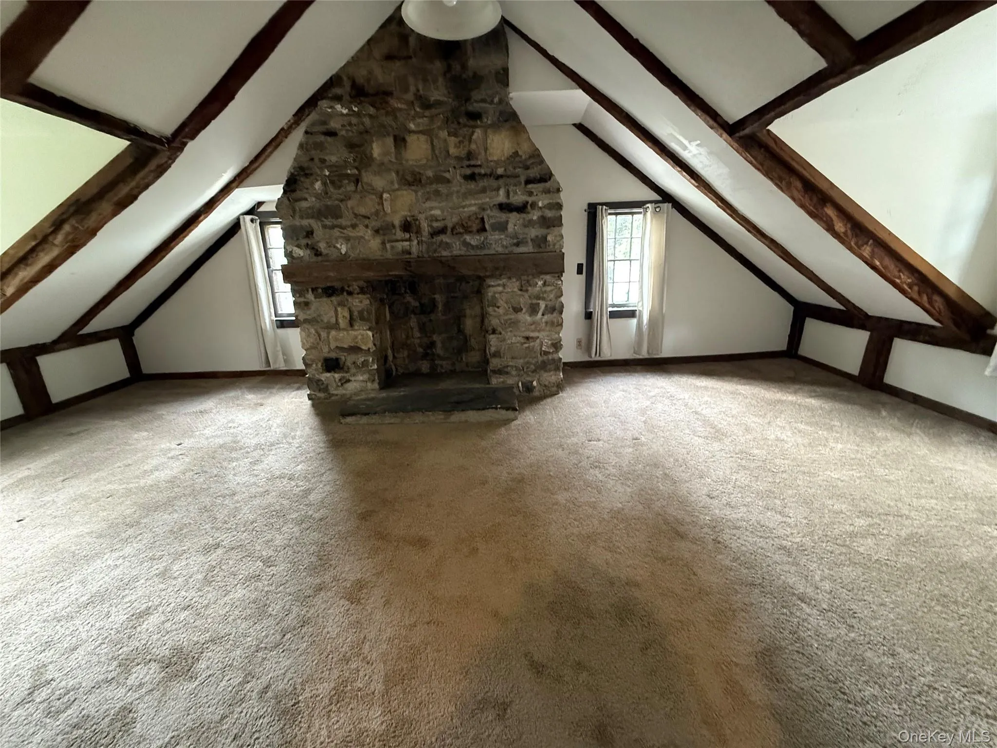 Additional living space with carpet flooring Additional living space with carpet flooring