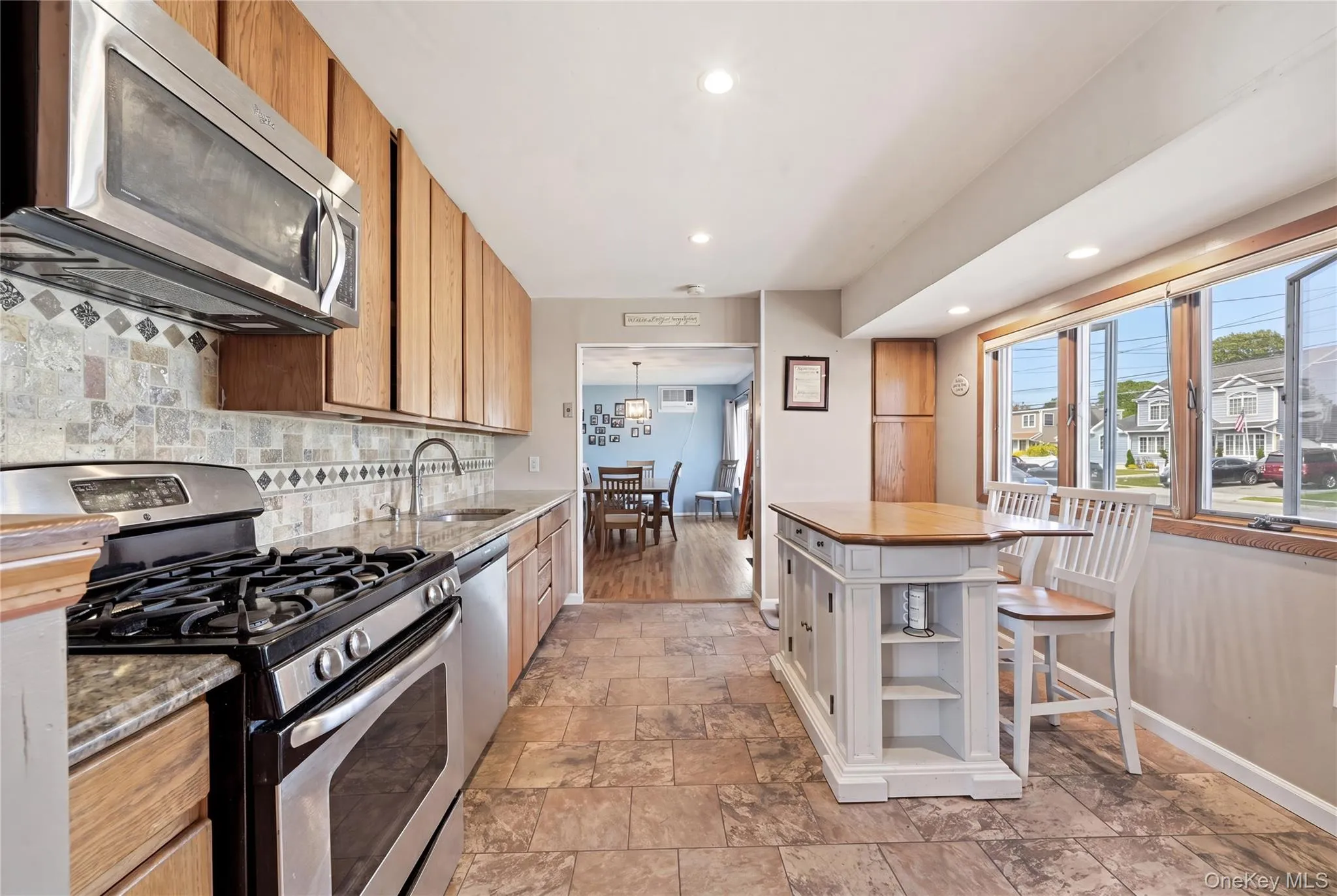 Kitchen with entrance to dining room. Kitchen with entrance to dining room.