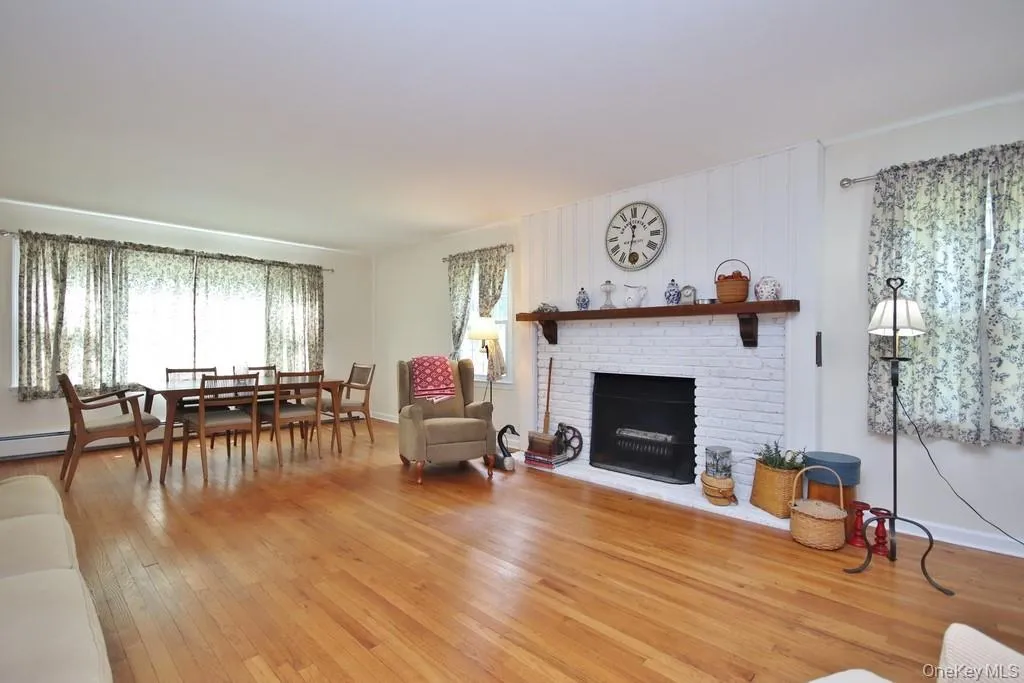 Large living room with brick fireplace Large living room with brick fireplace