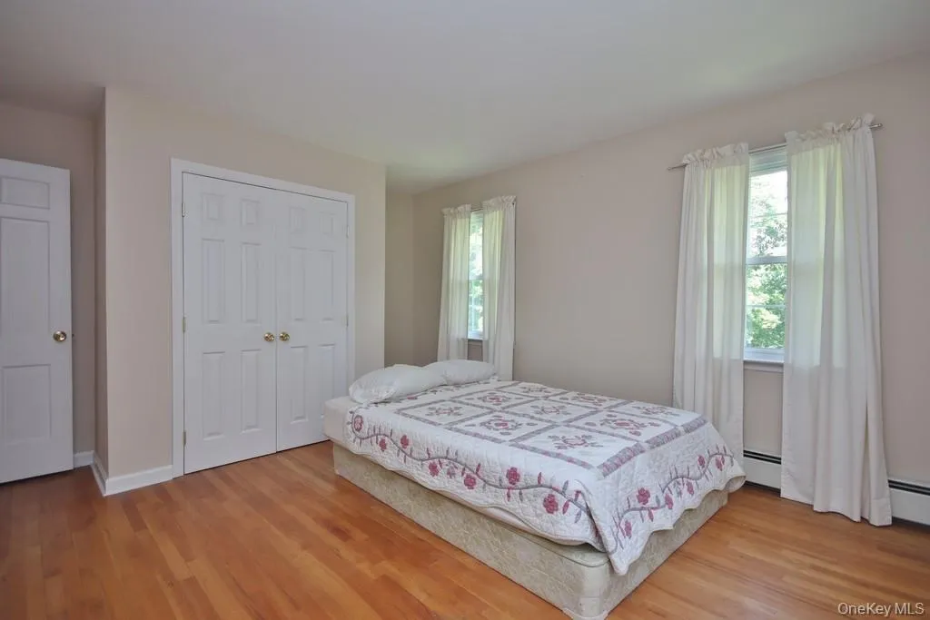 Bedroom #3 with hardwood floors Bedroom #3 with hardwood floors
