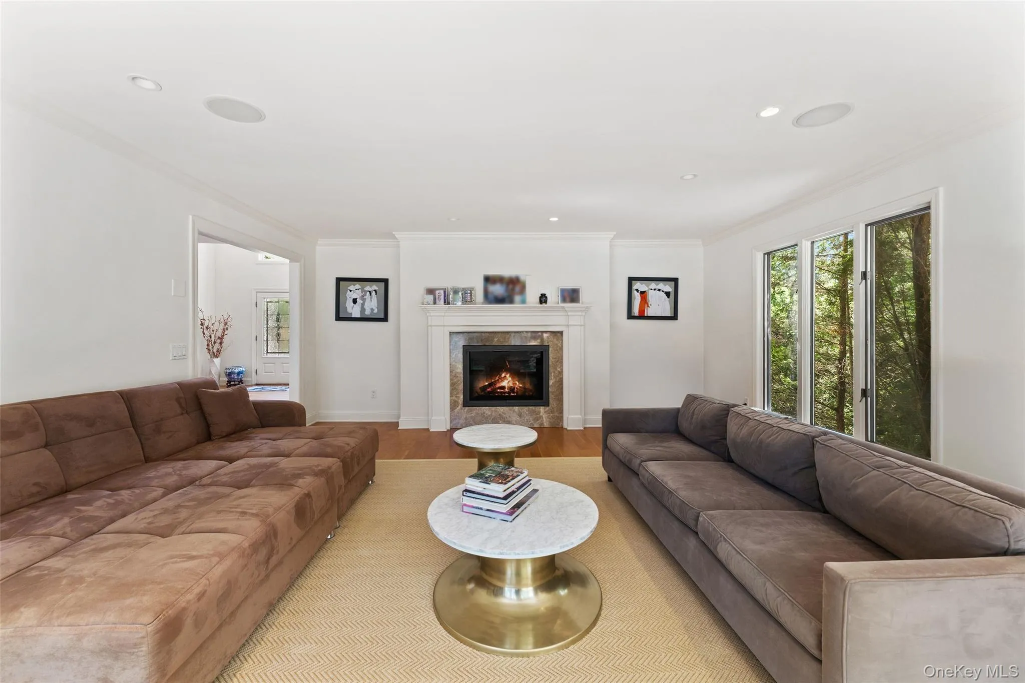 Another fireplace provides the perfect spot for cozy winter gatherings Another fireplace provides the perfect spot for cozy winter gatherings