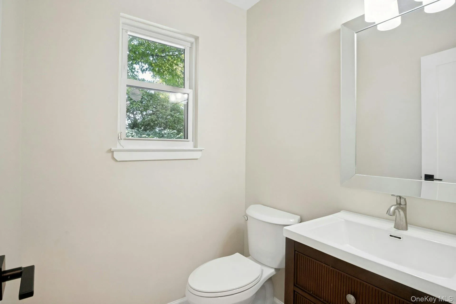 Powder room on the main level. Powder room on the main level.